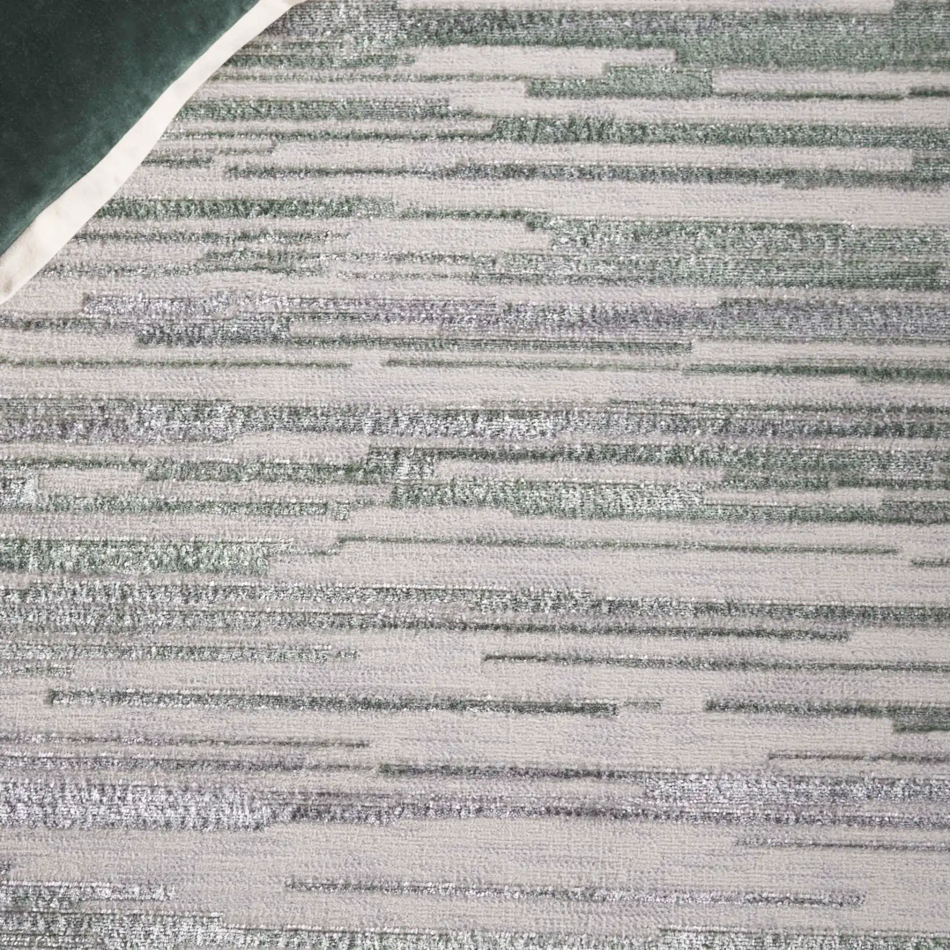 Orchard Abstract Stripe Rug in Gray / Green in a styled room