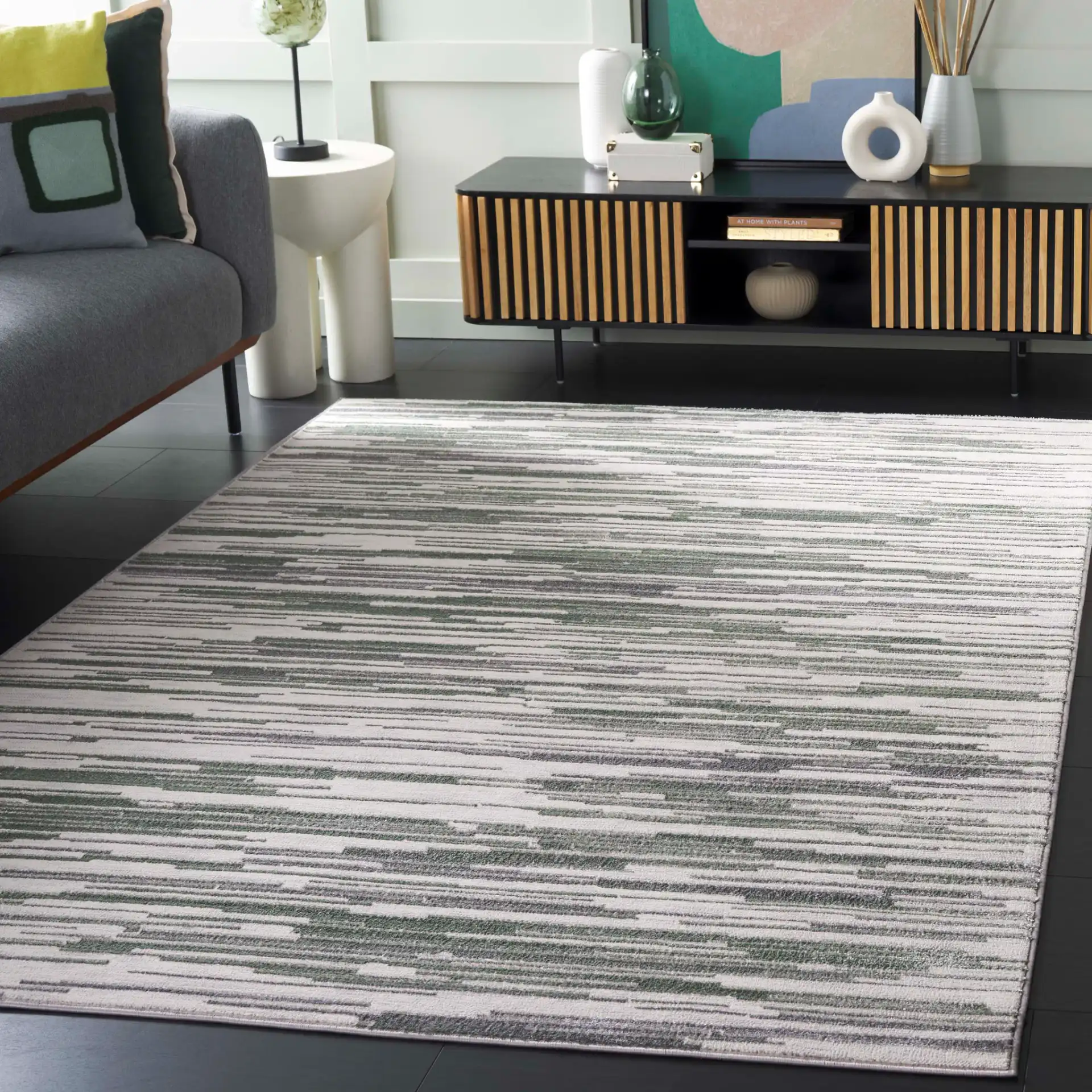Orchard Abstract Stripe Rug in Gray / Green in a styled room