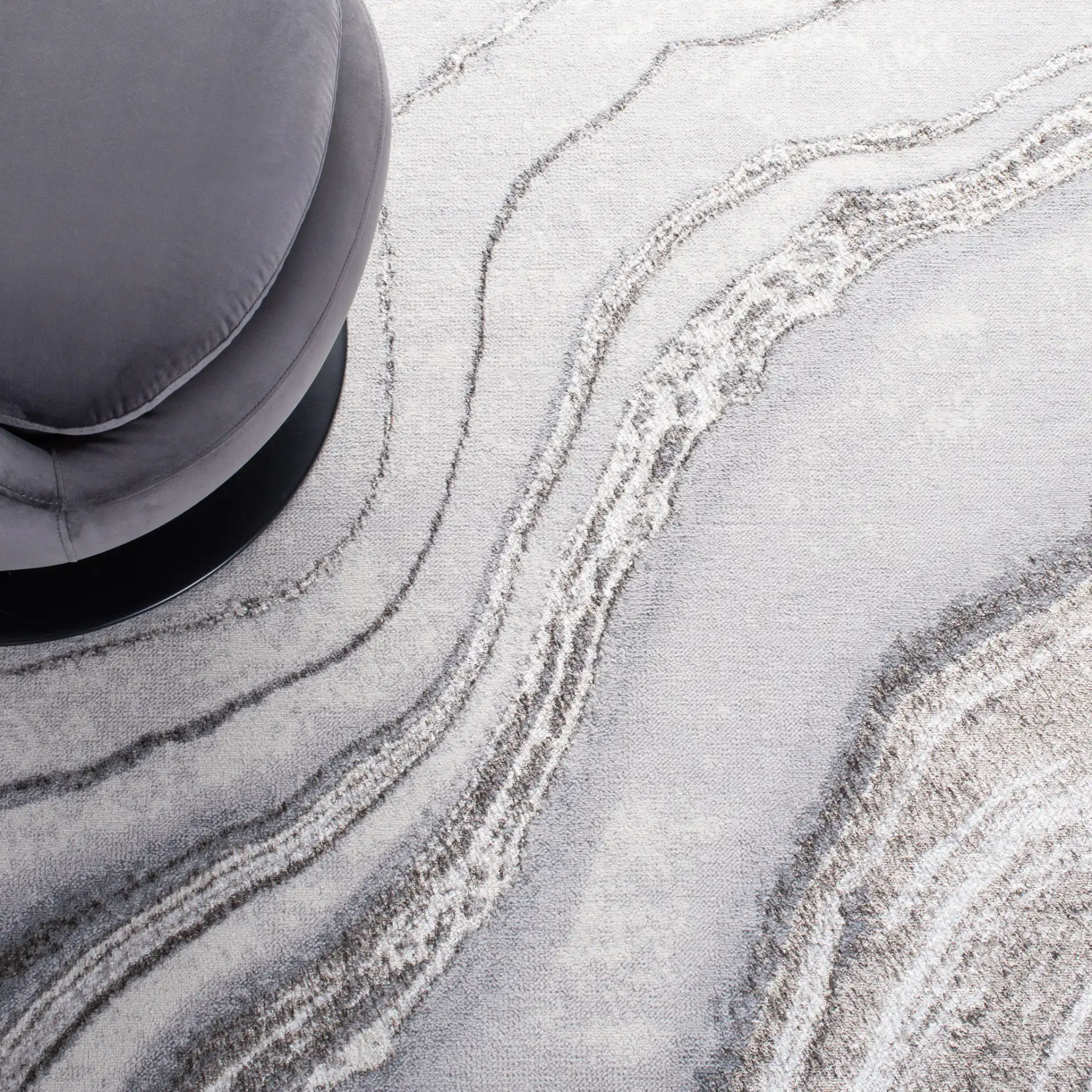 Orchard Marble Swirl Rug in Gray / Ivory in a styled room