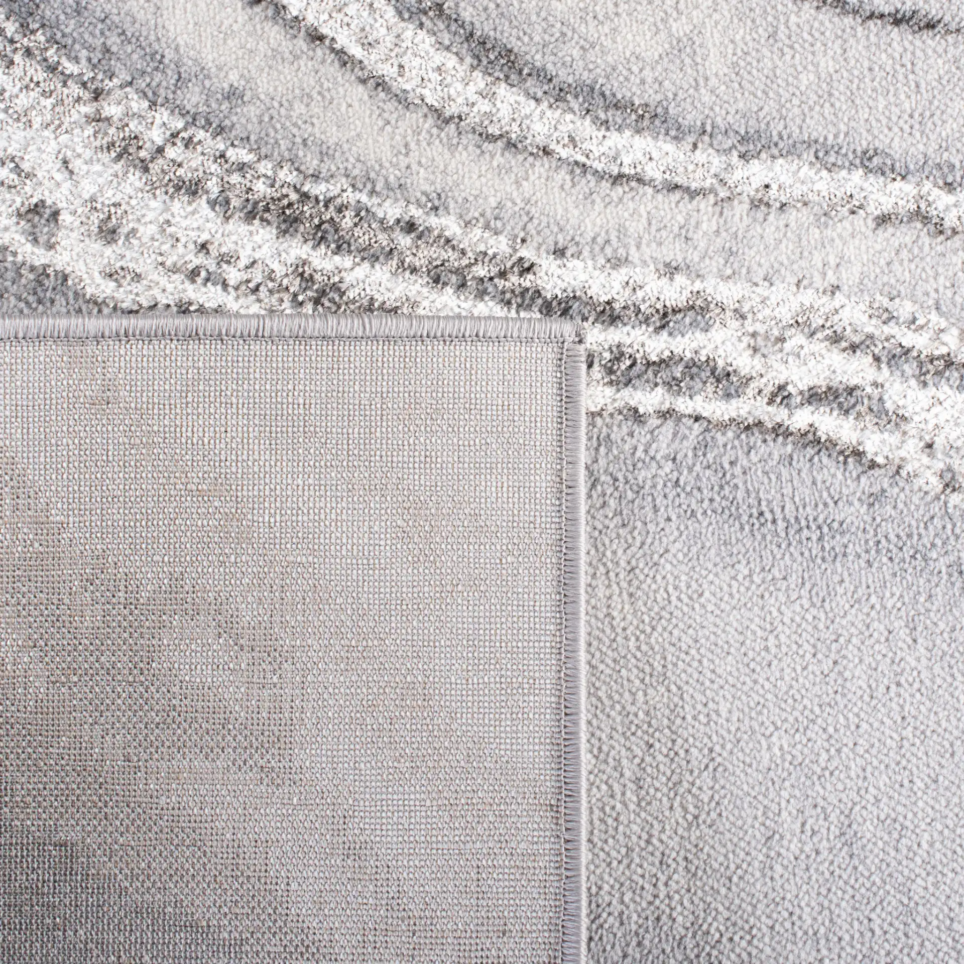 Orchard Marble Swirl Rug in Gray / Ivory in a styled room