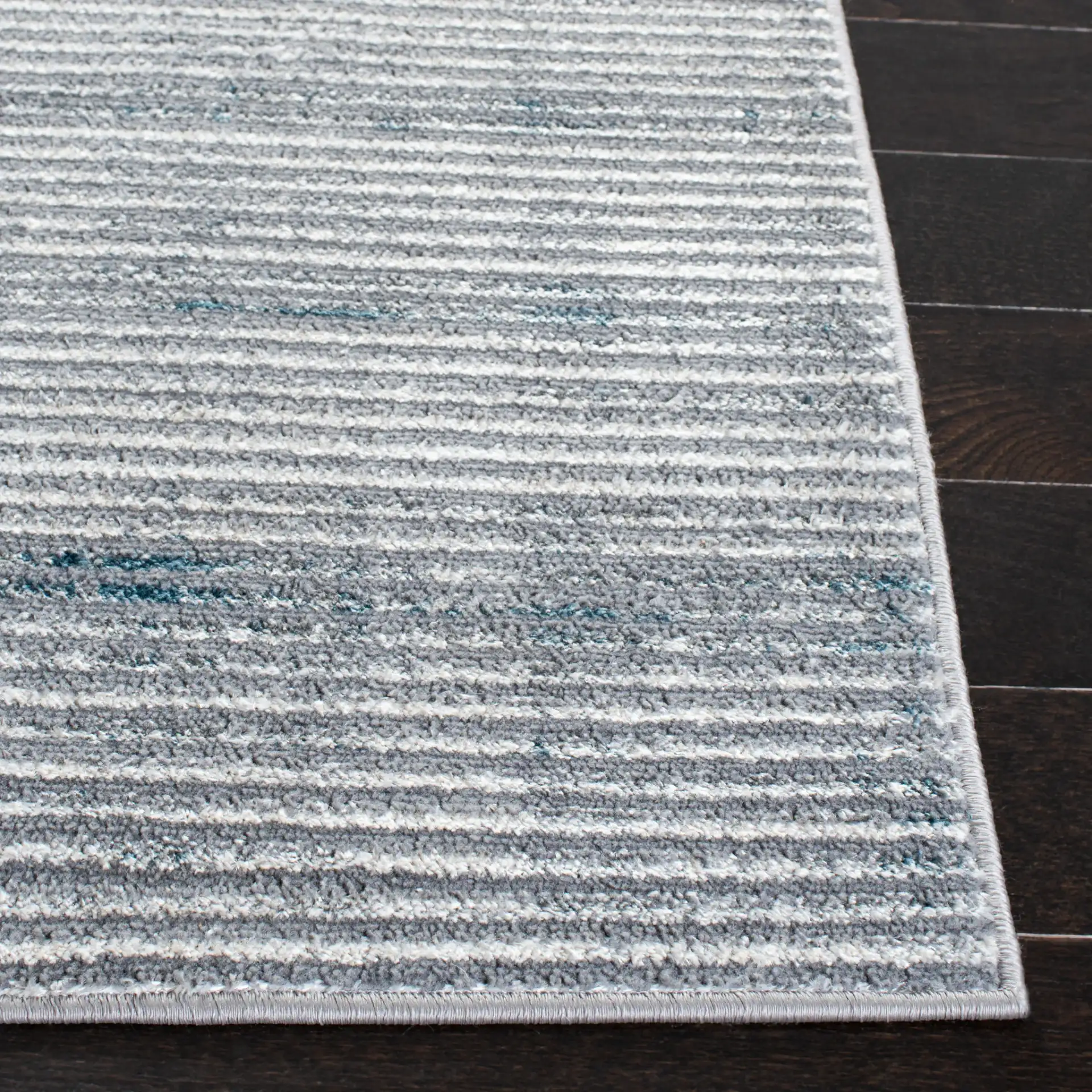 Orchard Distressed Stripe Rug in Gray / Blue in a styled room