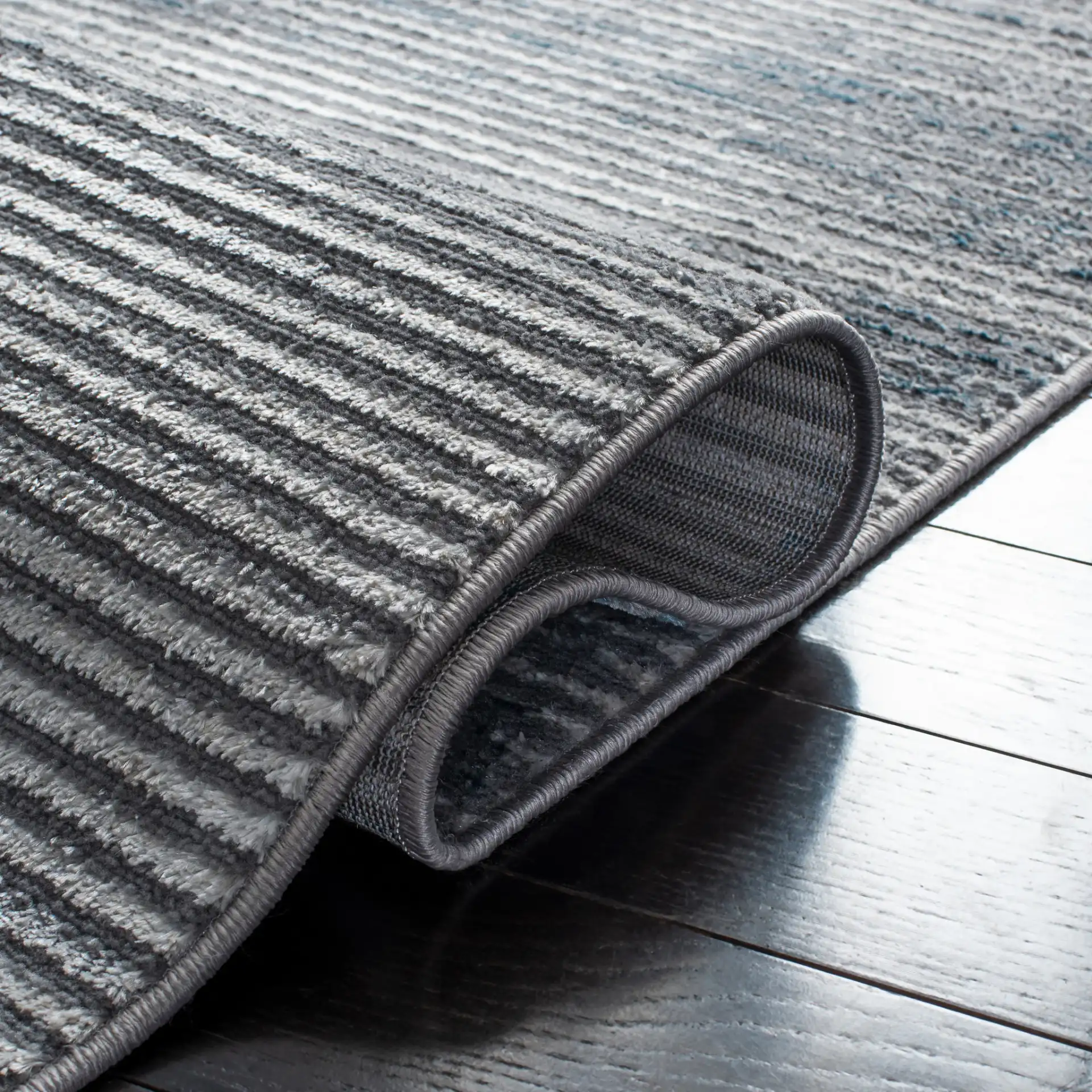 Orchard Distressed Stripe Rug in Gray / Blue in a styled room