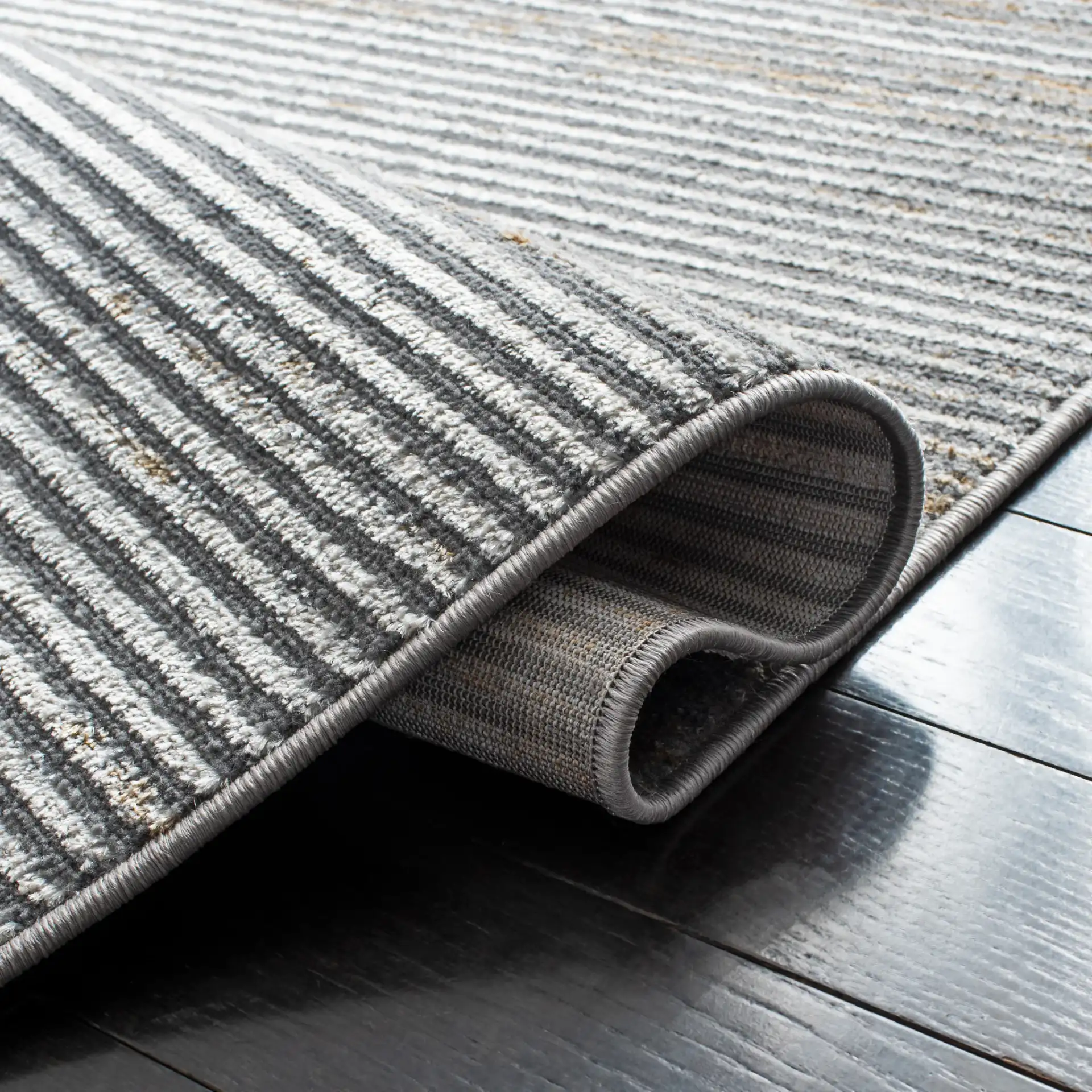 Orchard Distressed Stripe Rug in Gray / Gold in a styled room