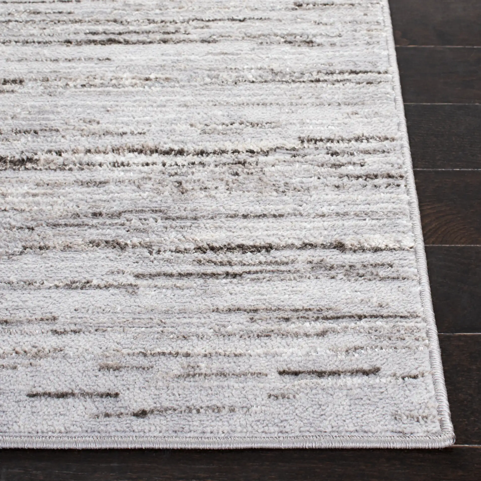 Orchard Linear Abstract Rug in Gray / Light Gray in a styled room