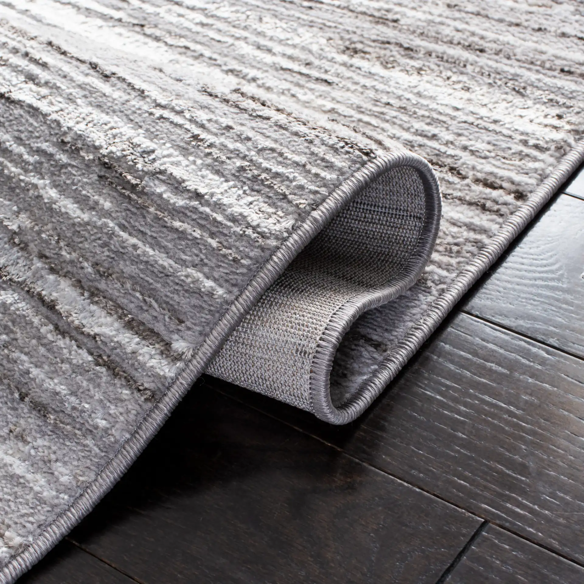 Orchard Linear Abstract Rug in Gray / Light Gray in a styled room