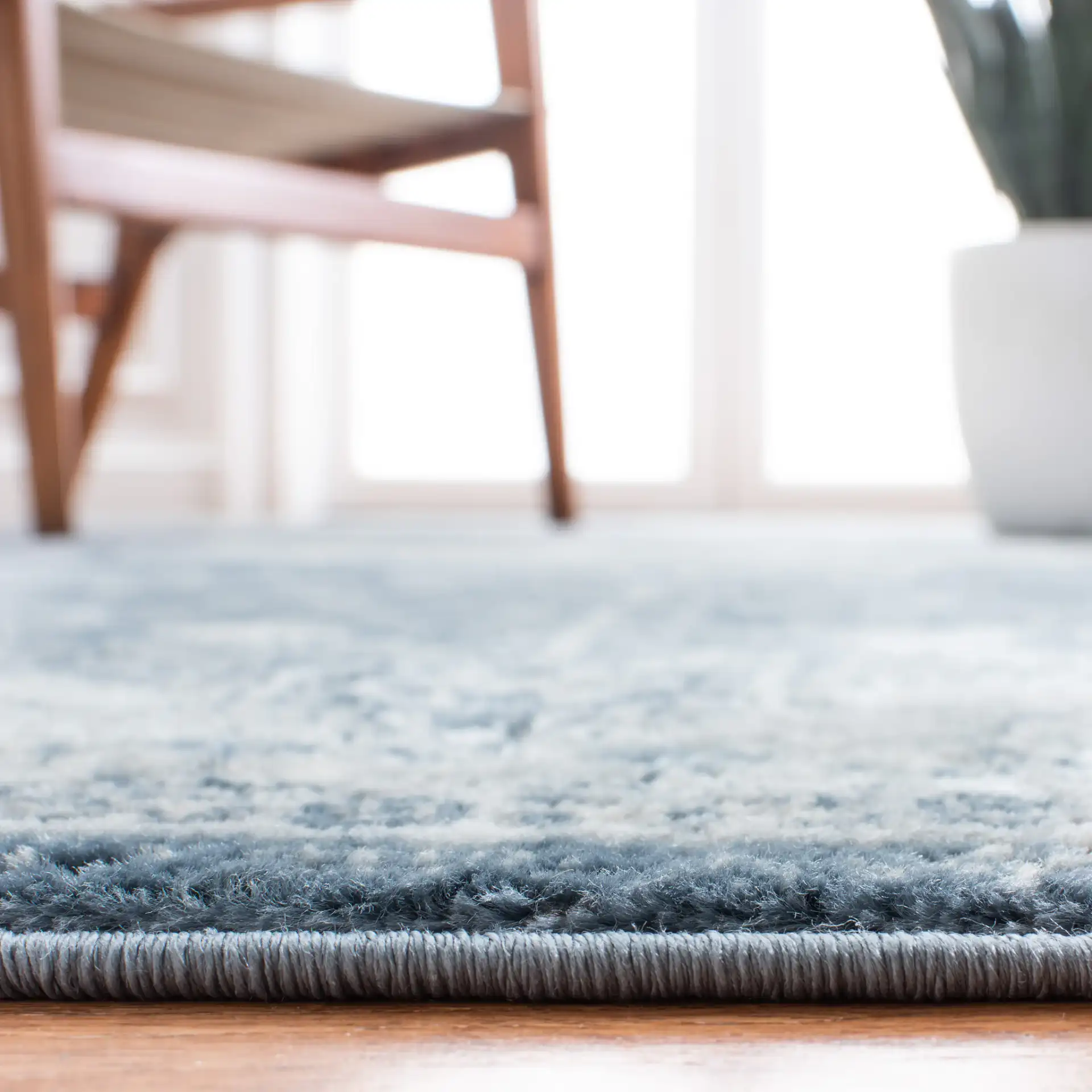 Oregon Faded Medallion Rug in Navy / Ivory in a styled room