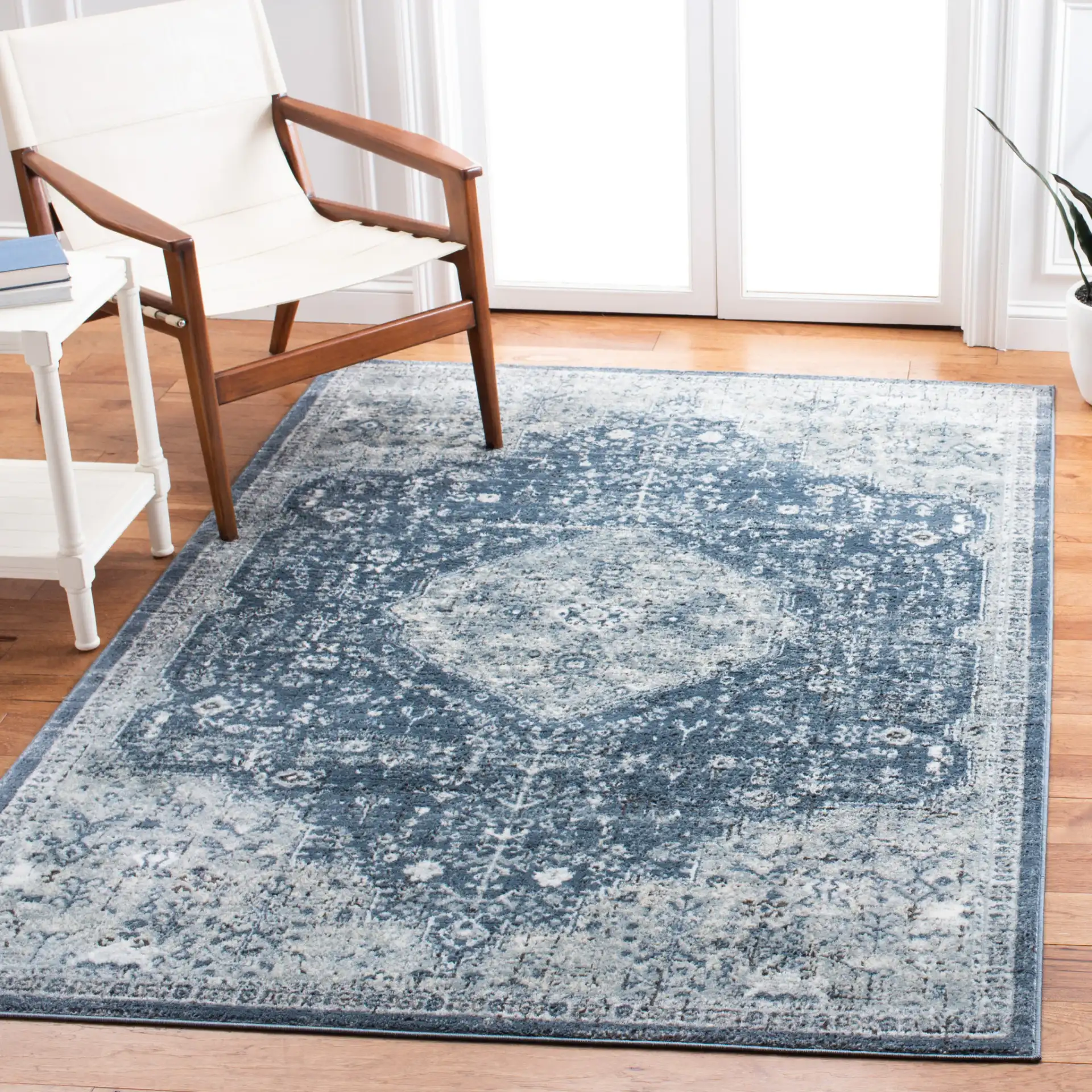 Oregon Faded Medallion Rug in Navy / Ivory in a styled room