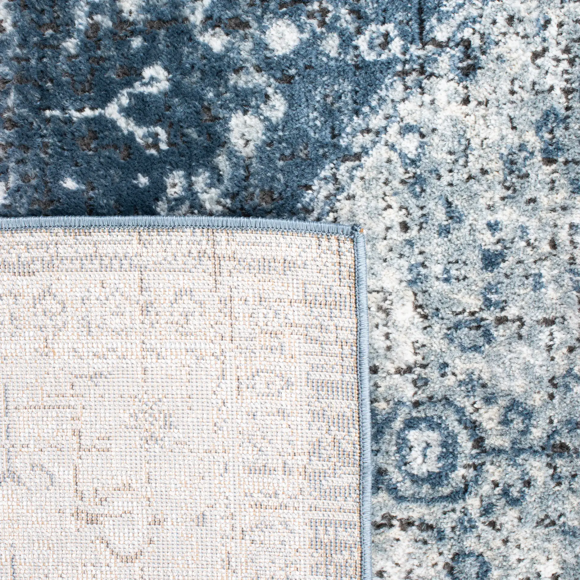 Oregon Faded Medallion Rug in Navy / Ivory in a styled room