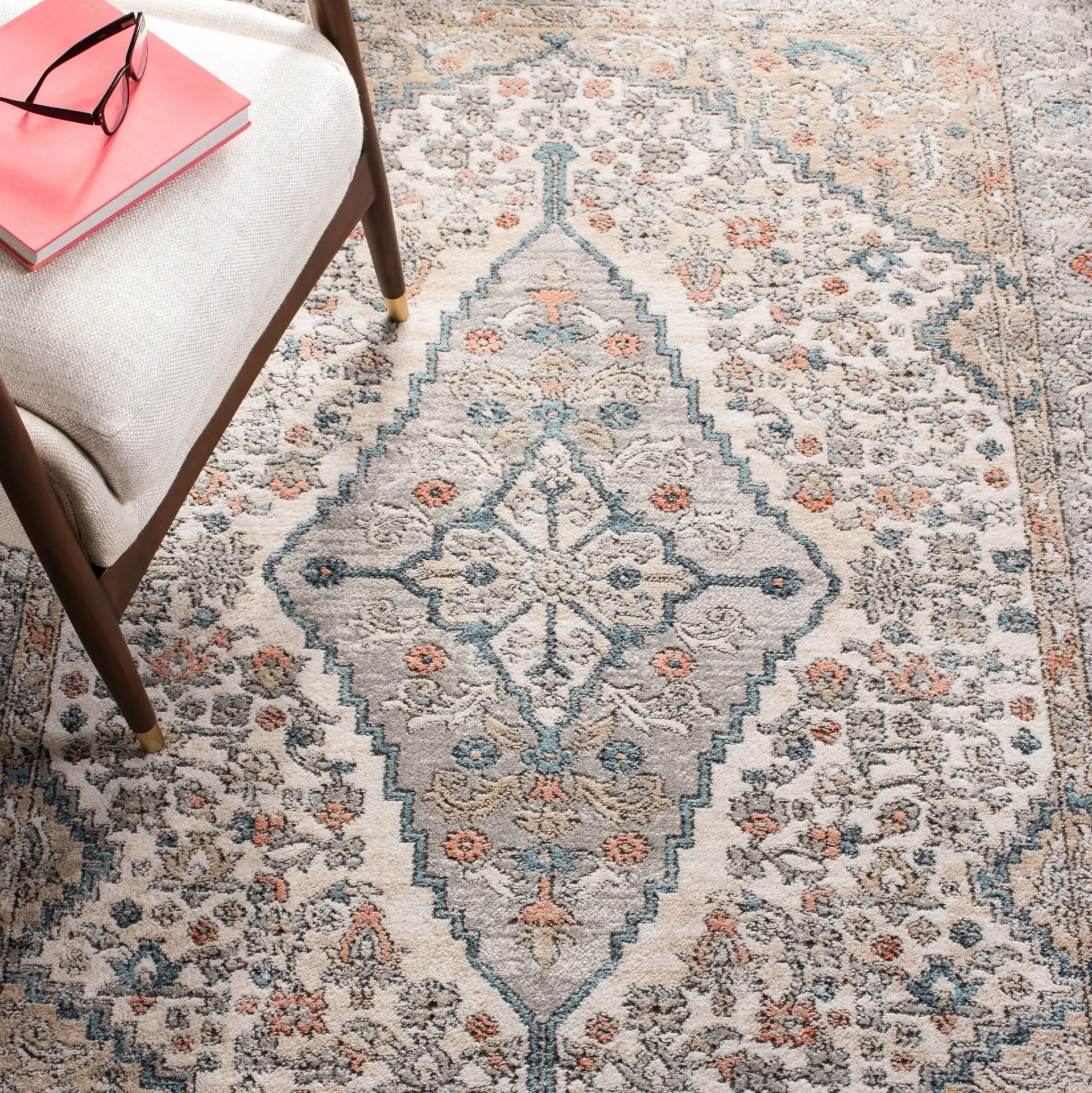 Oregon Diamond Medallion Rug in Gray / Ivory in a styled room