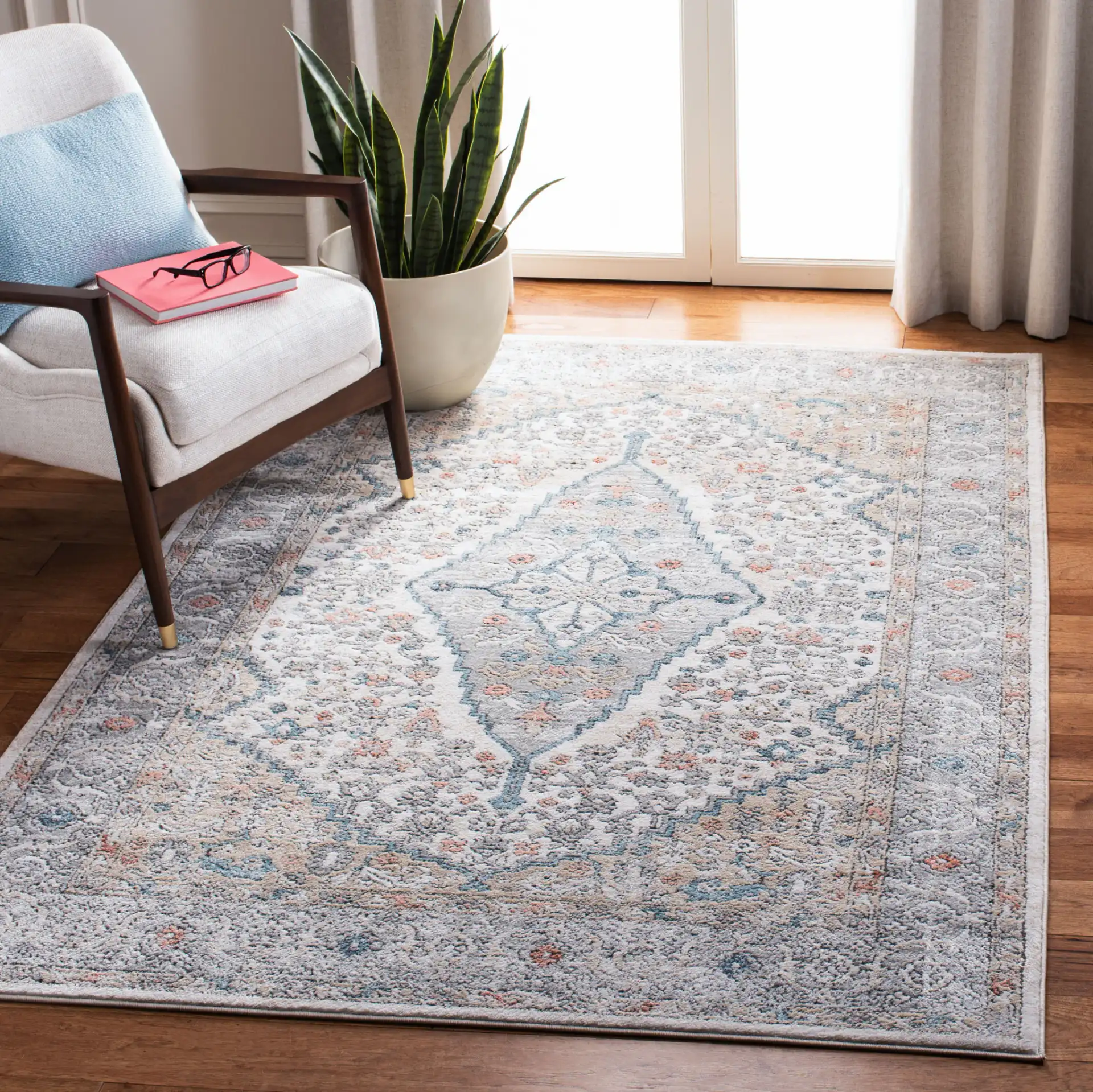 Oregon Diamond Medallion Rug in Gray / Ivory in a styled room