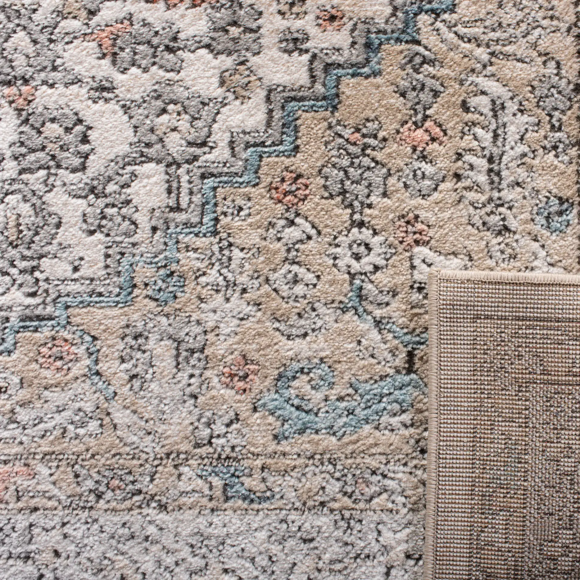 Oregon Diamond Medallion Rug in Gray / Ivory in a styled room