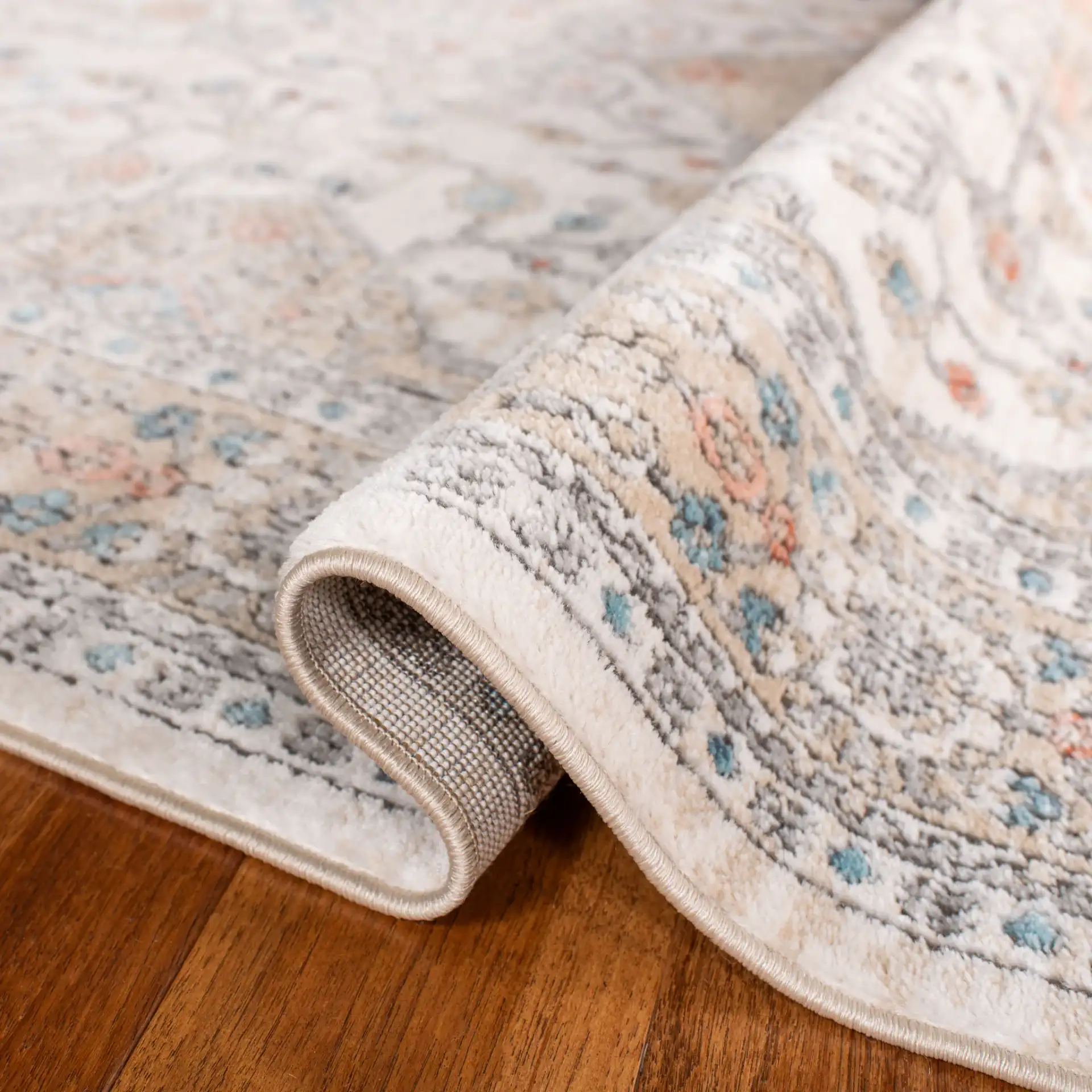 Oregon Stepped Medallion Rug in Gray / Ivory in a styled room