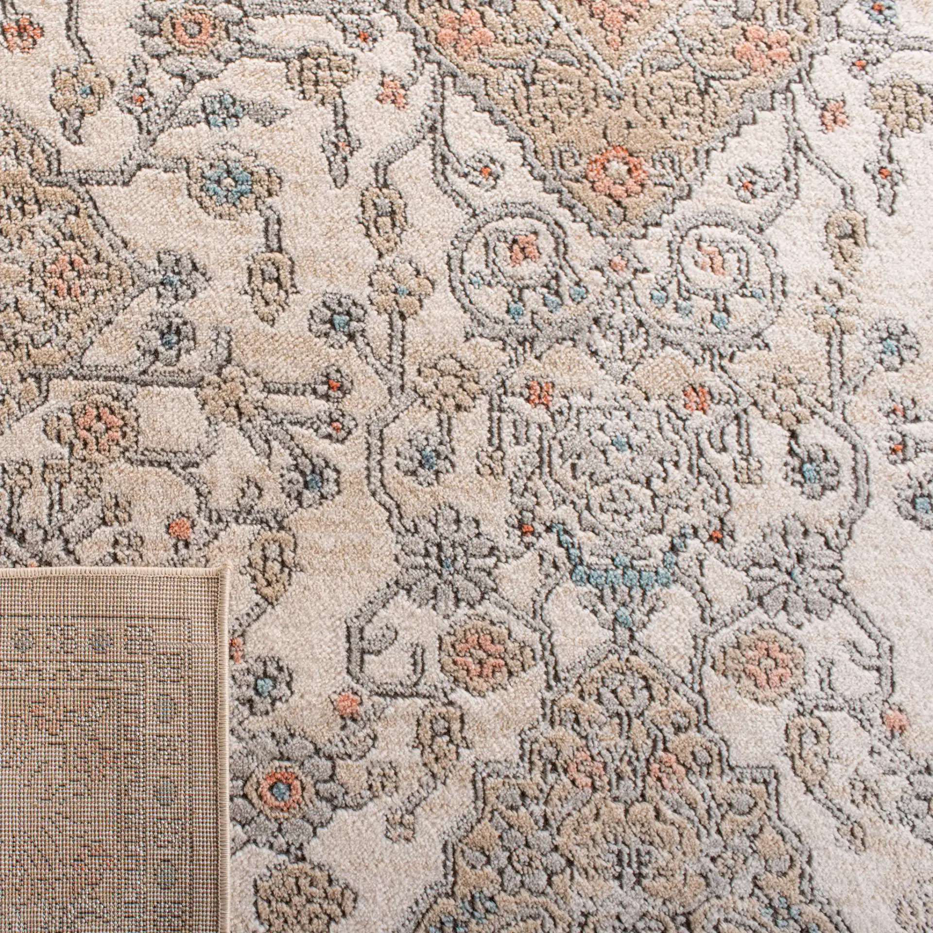 Oregon Stepped Medallion Rug in Gray / Ivory in a styled room
