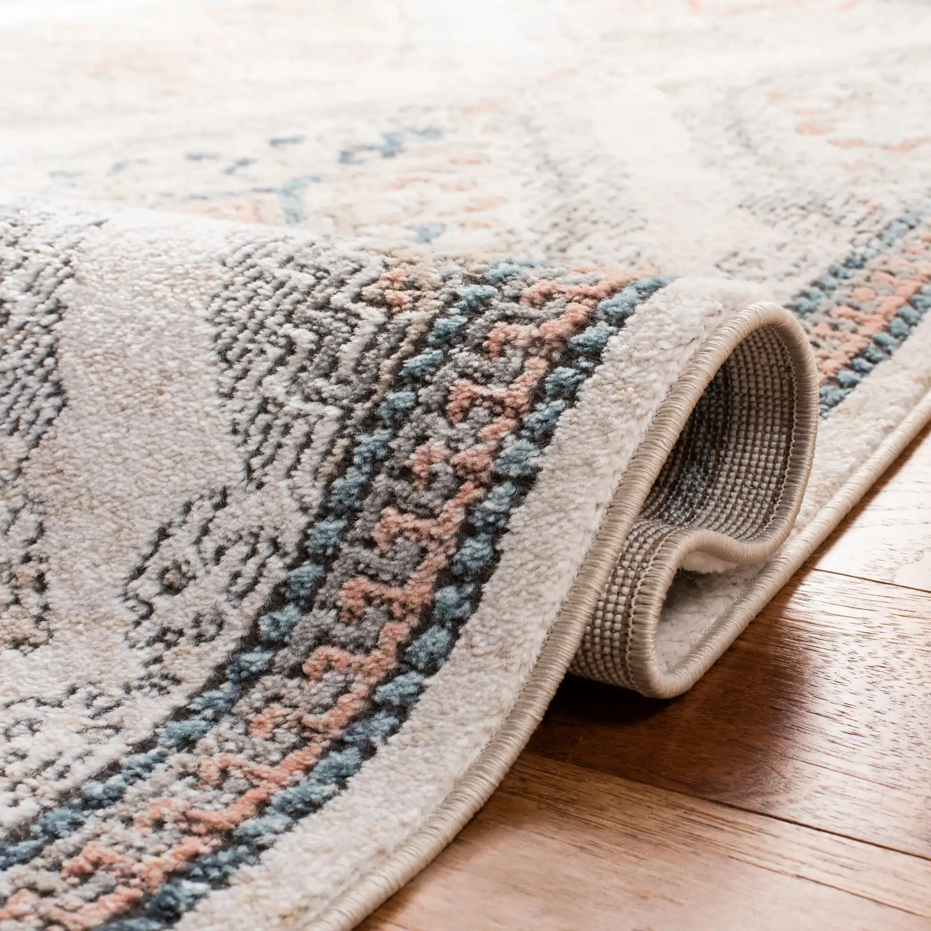 Oregon Tribal Diamond Rug in Gray / Ivory in a styled room