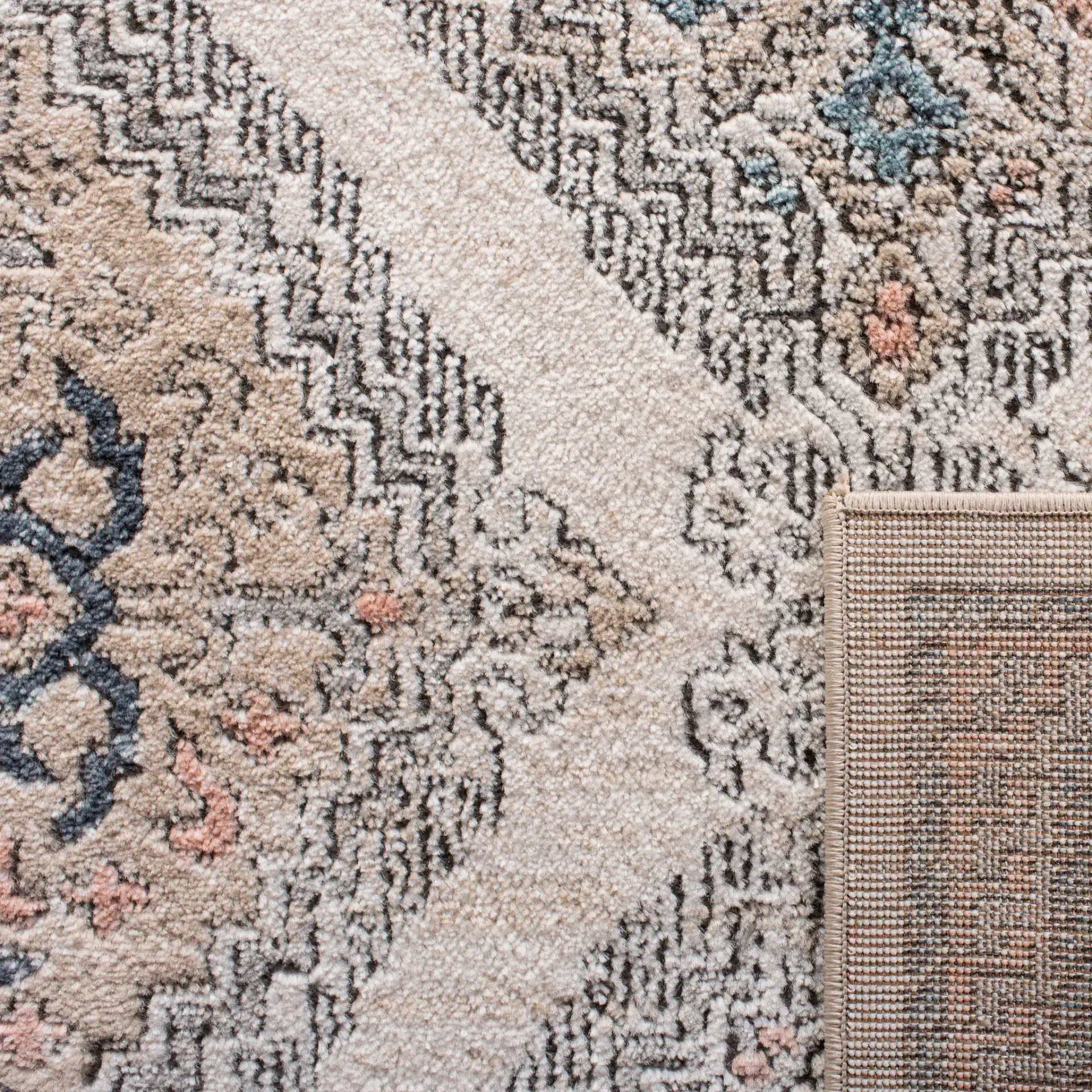 Oregon Tribal Diamond Rug in Gray / Ivory in a styled room