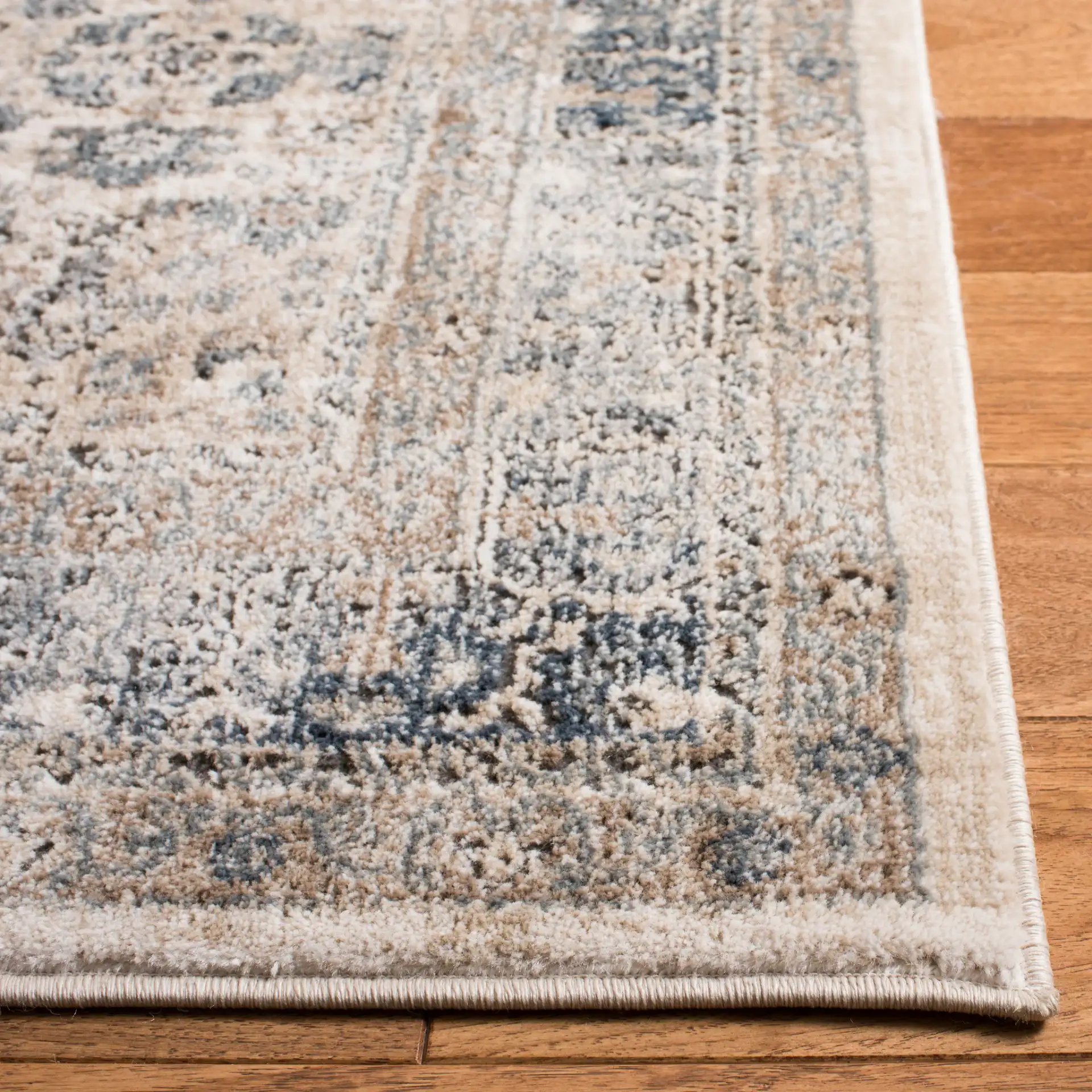 Oregon Traditional Oval Medallion Rug in Beige / Gray in a styled room