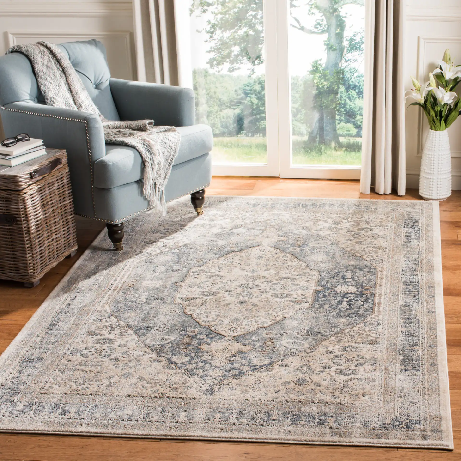 Oregon Traditional Oval Medallion Rug in Beige / Gray in a styled room