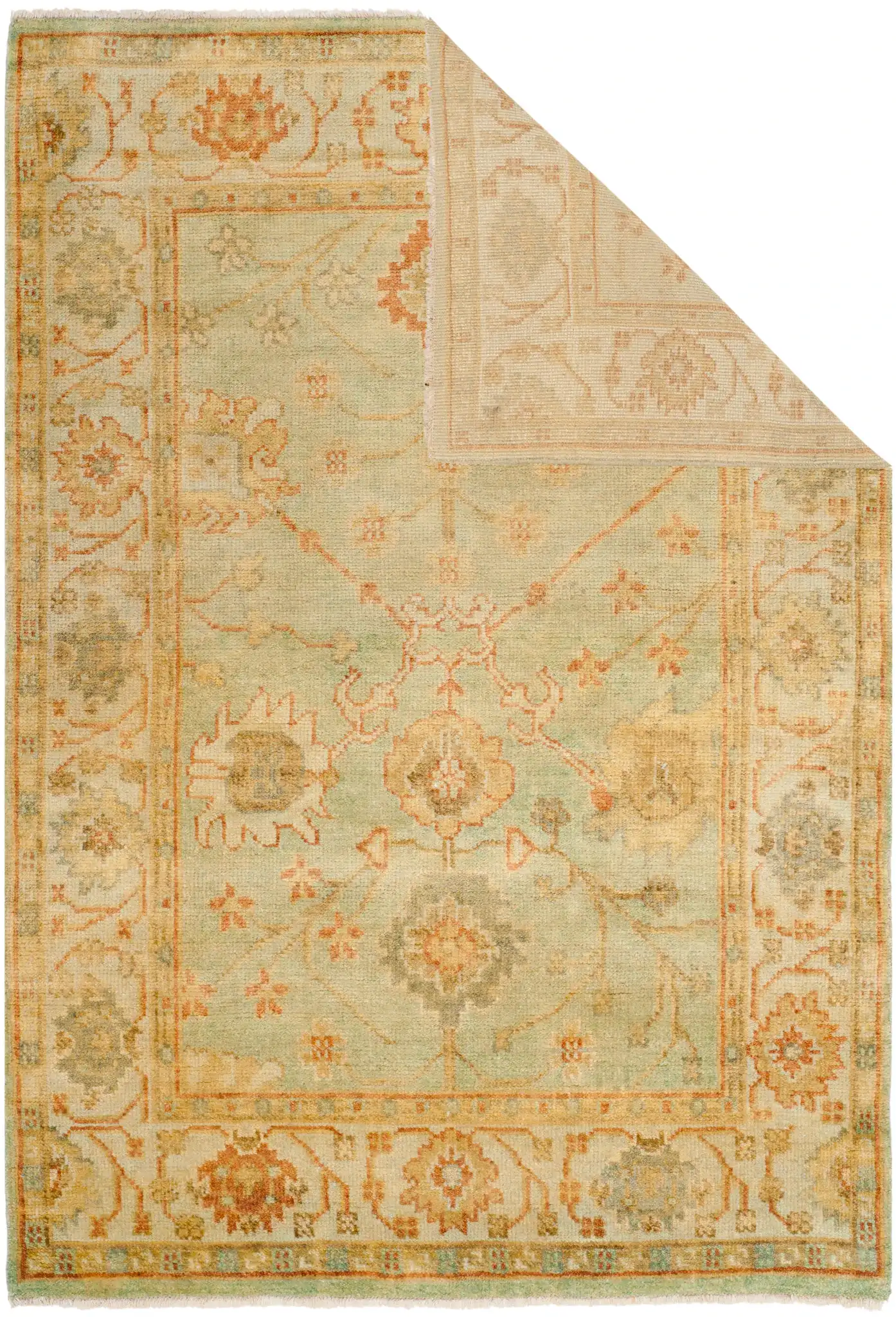 Oushak Faded Vine Hand-Knotted Wool Rug in Dark Green / Light Green in a styled room