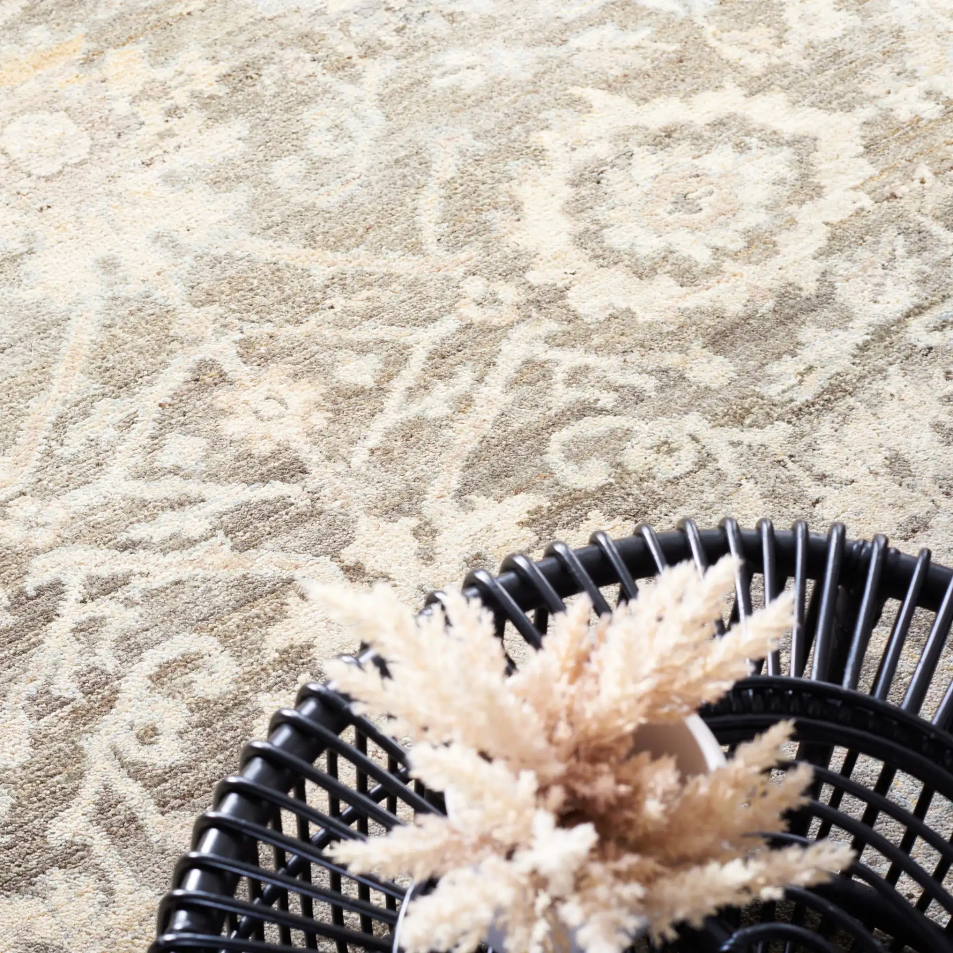 Oushak Allover Floral Vine Hand-Knotted Wool Rug in Gray / Ivory in a styled room