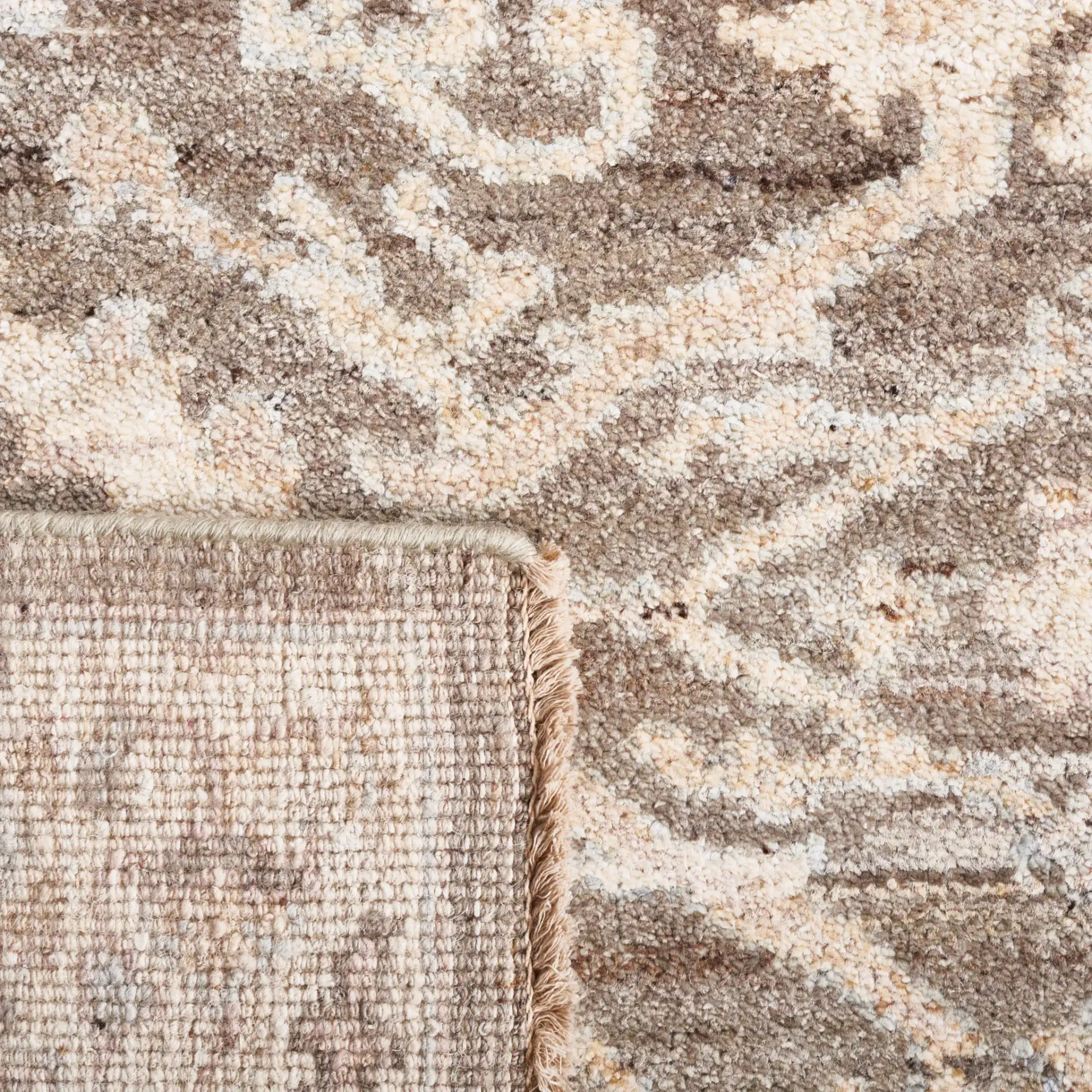 Oushak Allover Floral Vine Hand-Knotted Wool Rug in Gray / Ivory in a styled room