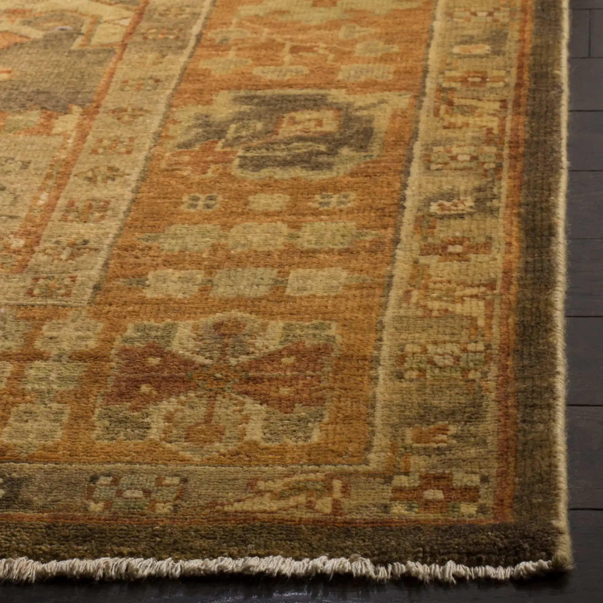 Oushak Trellis Hand-Knotted Wool Rug in Brown / Rust in a styled room