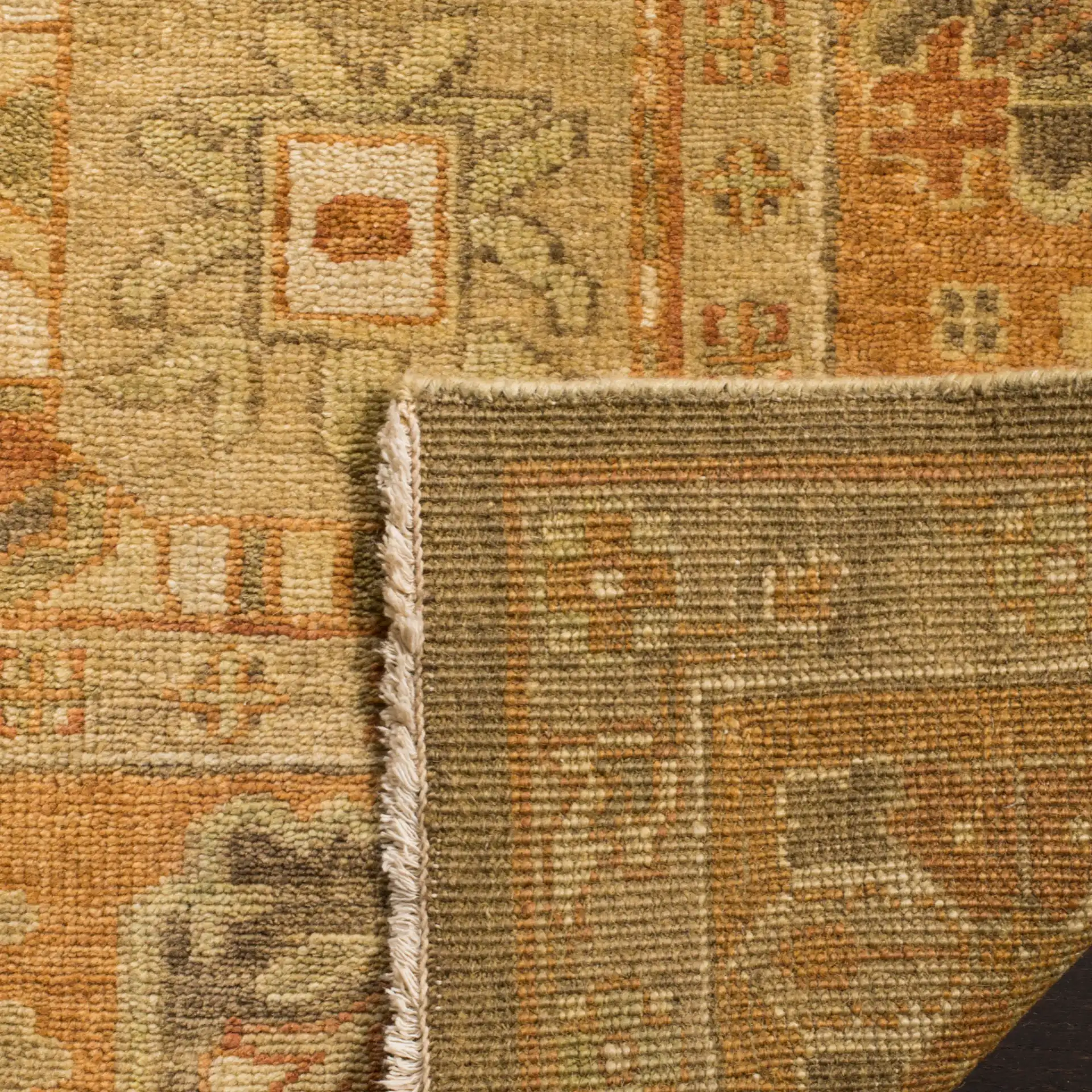 Oushak Trellis Hand-Knotted Wool Rug in Brown / Rust in a styled room