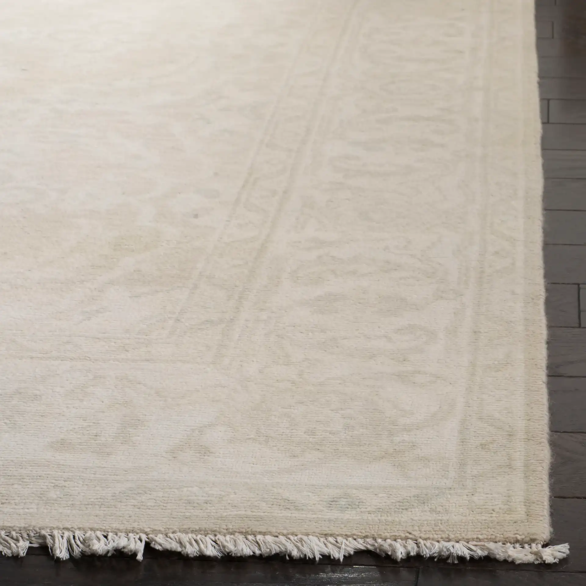 Oushak Damask Floral Hand-Knotted Wool Rug in Light Gray / Ivory in a styled room