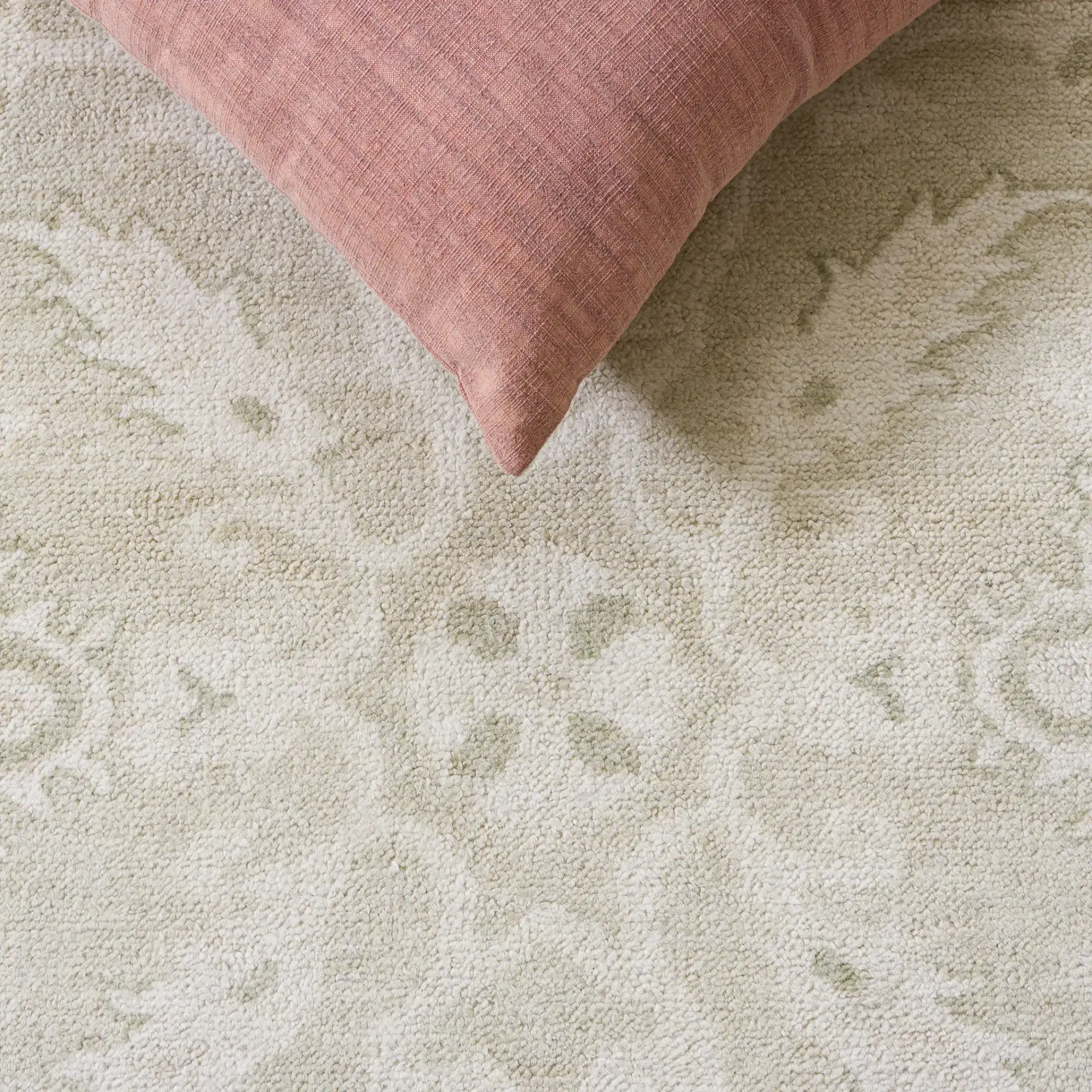 Oushak Damask Floral Hand-Knotted Wool Rug in Light Gray / Ivory in a styled room