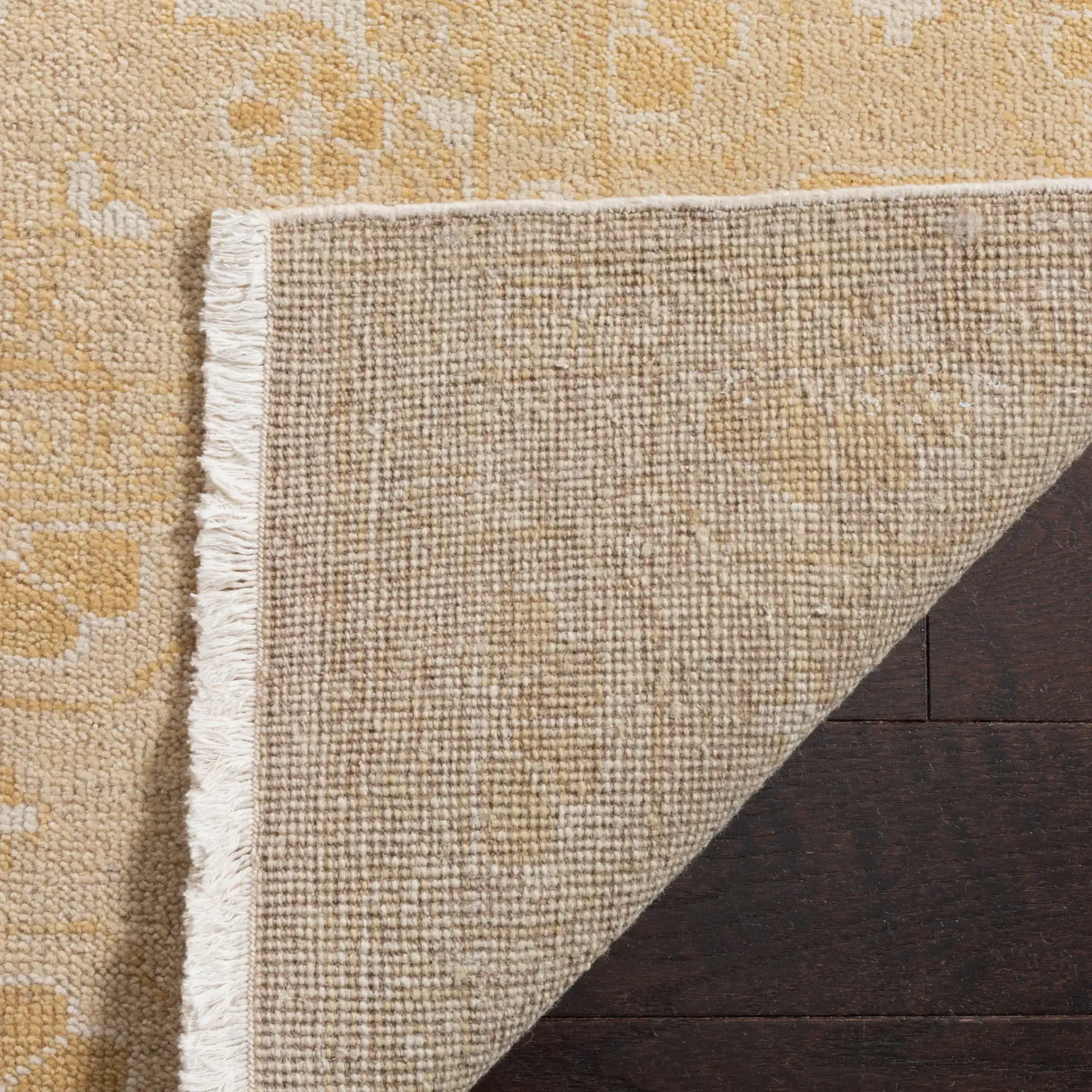 Oushak Palmette And Vine Hand-Knotted Wool Rug in Gold in a styled room