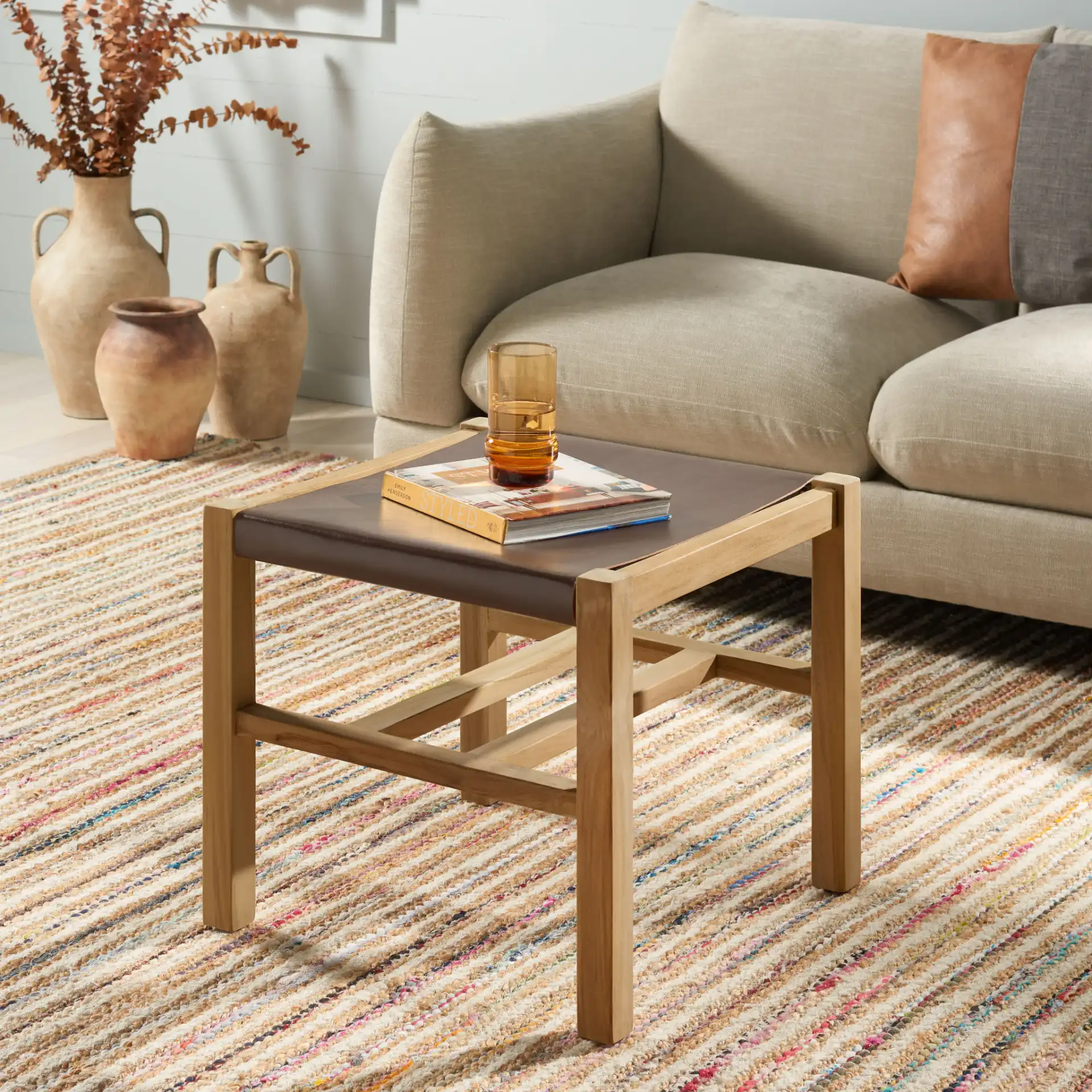 Solana Ottoman in Cognac / Natural in a styled room