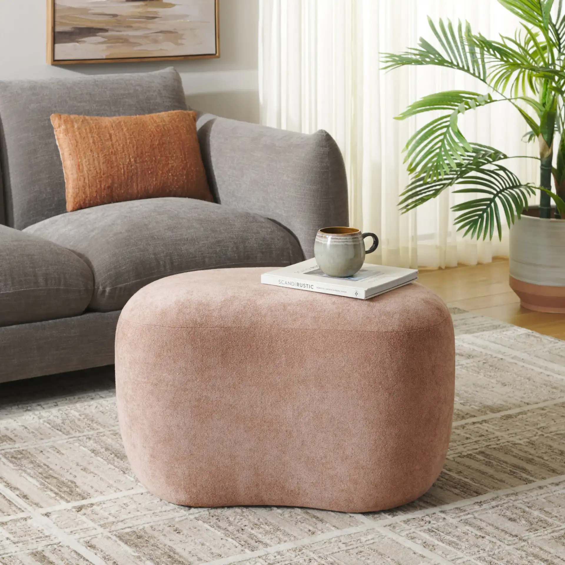 Regut Ottoman in Peach in a styled room