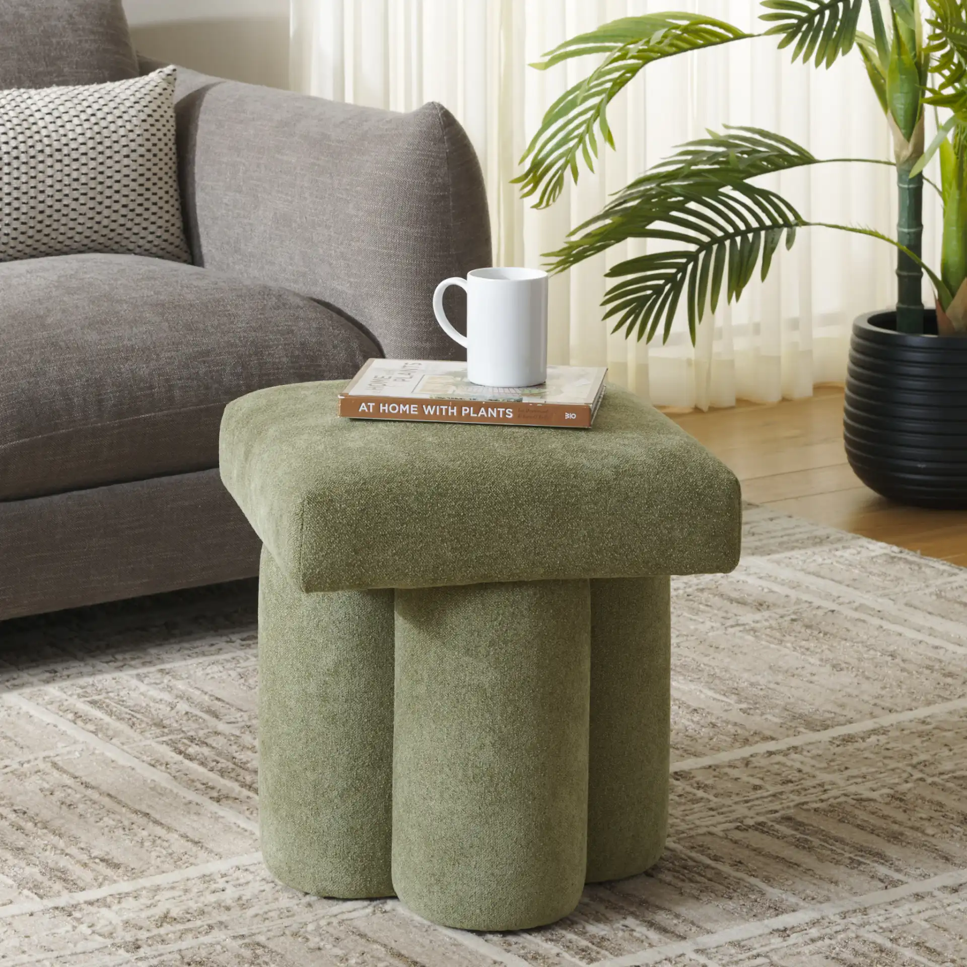 Farq Square Top Ottoman in Moss in a styled room