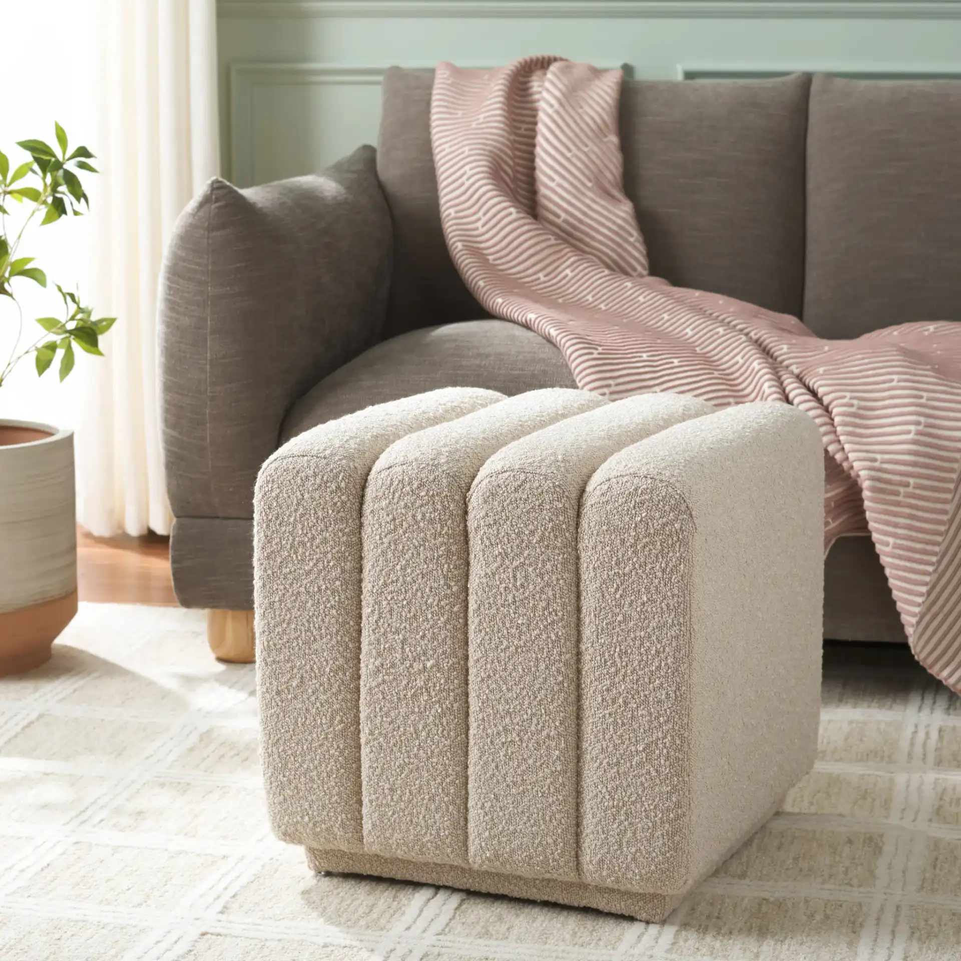 Joseph Square Ottoman in Beige in a styled room