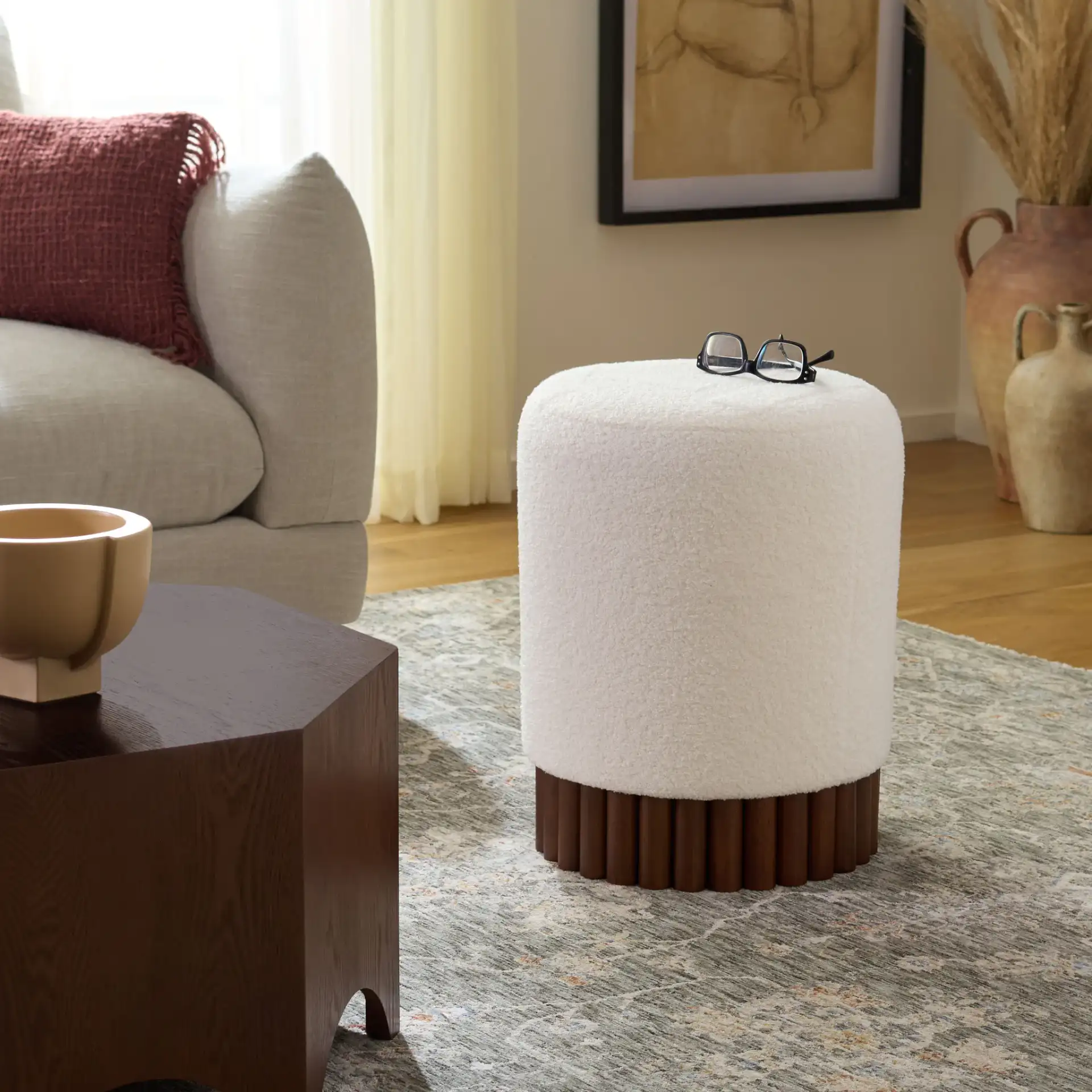 Cerna Ottoman in Off-White / Dark Brown in a styled room