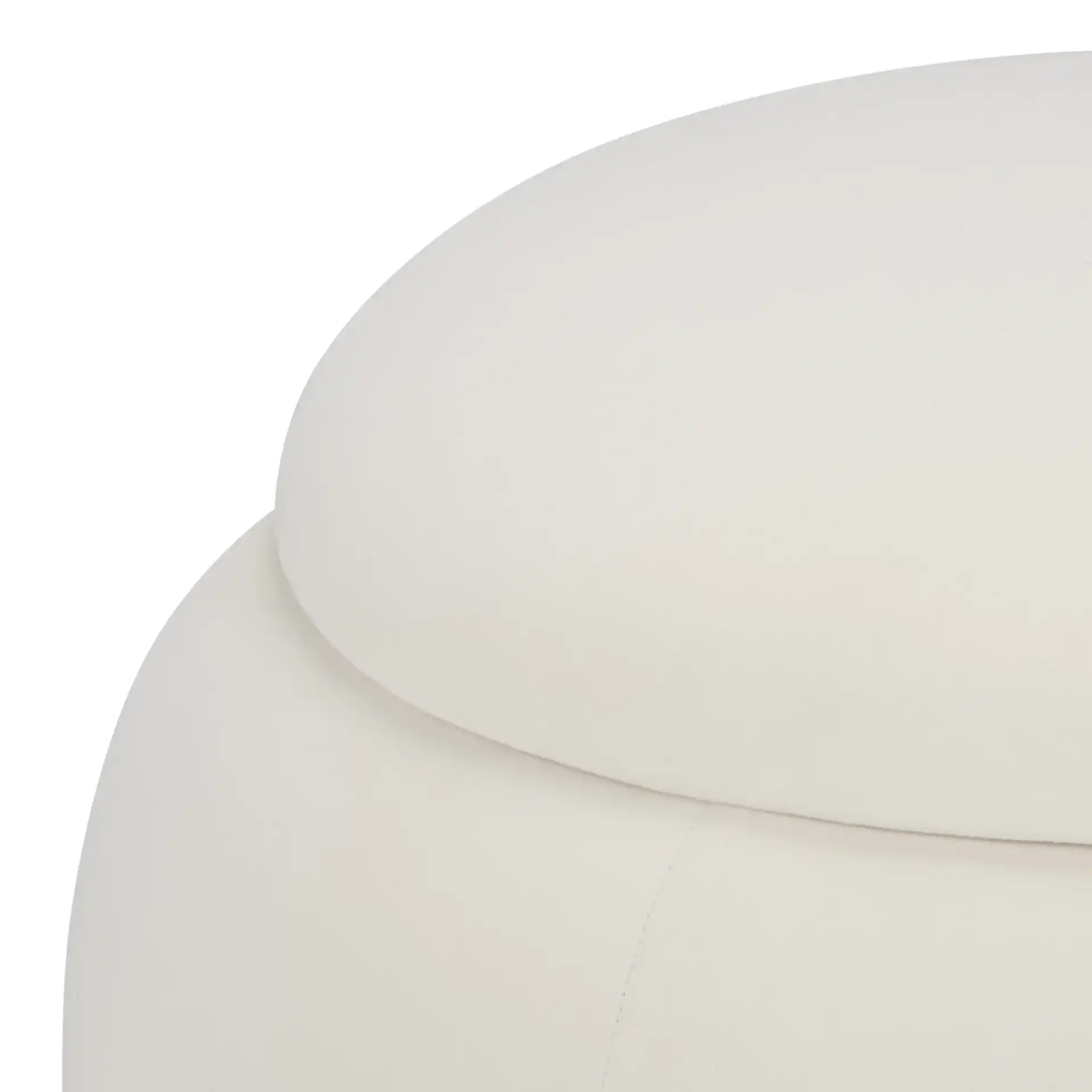 Siara Round Storage Ottoman in Cream in a styled room
