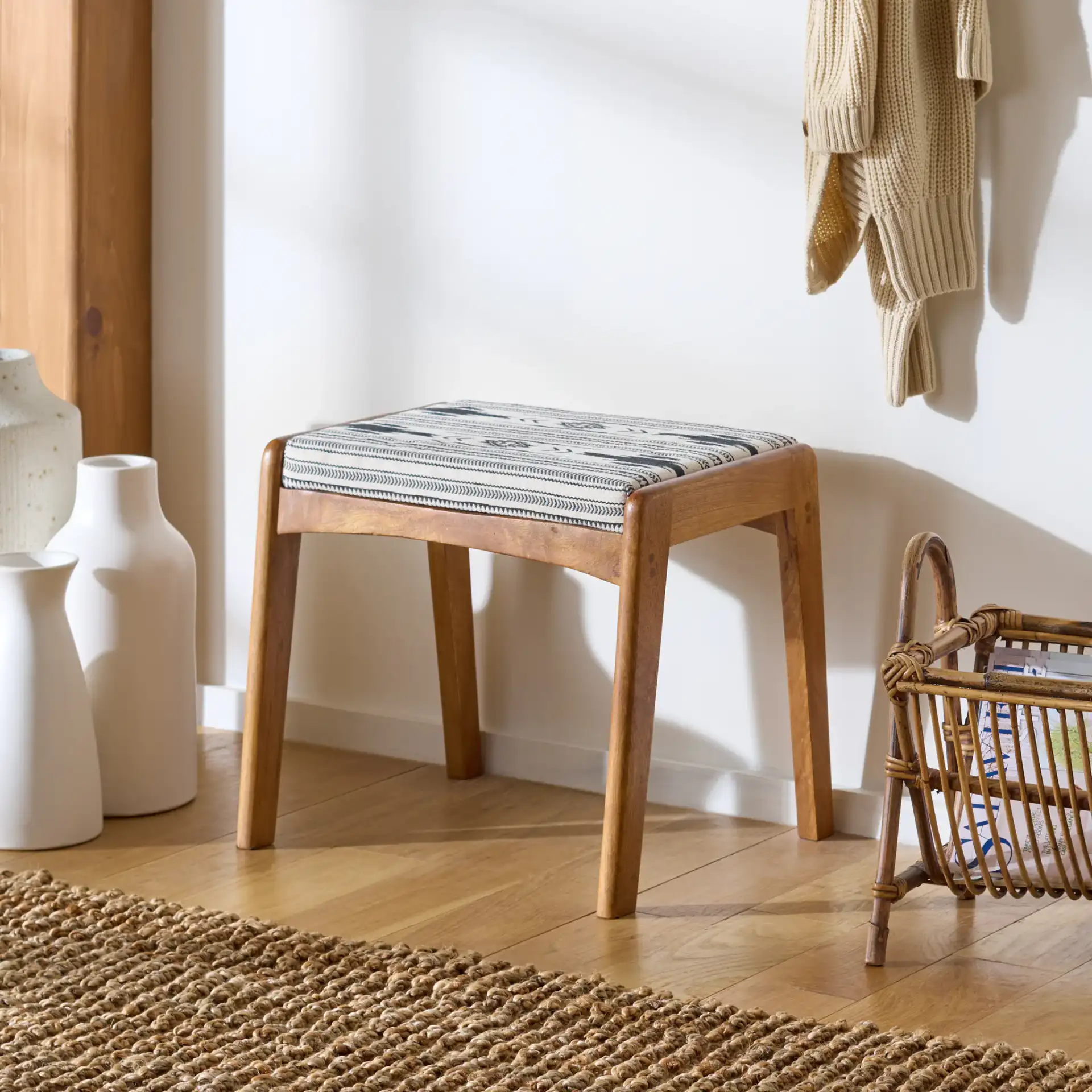 Ute Ottoman in Navy Blue White / Natural in a styled room