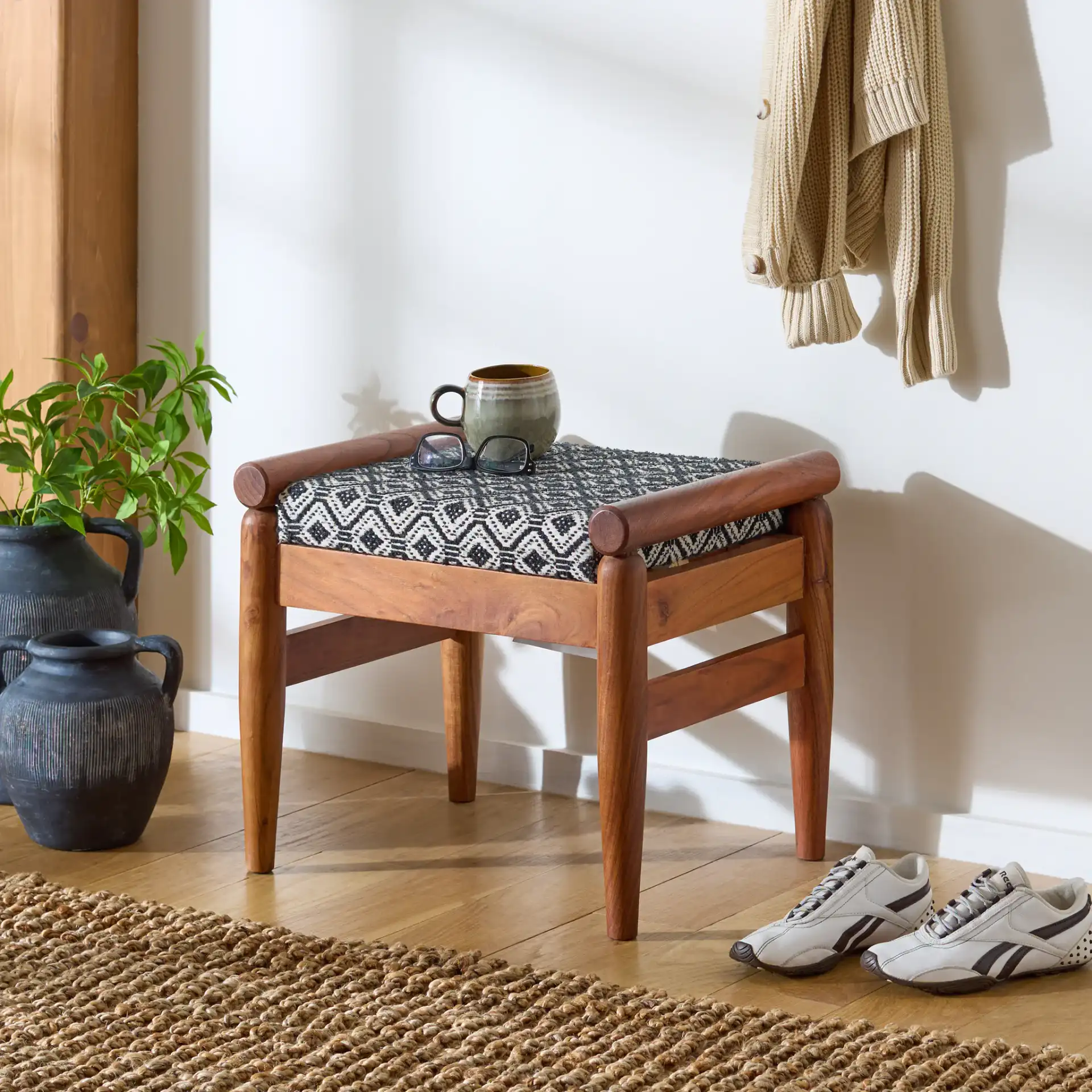 Elmar Ottoman in Navy Blue White / Natural in a styled room