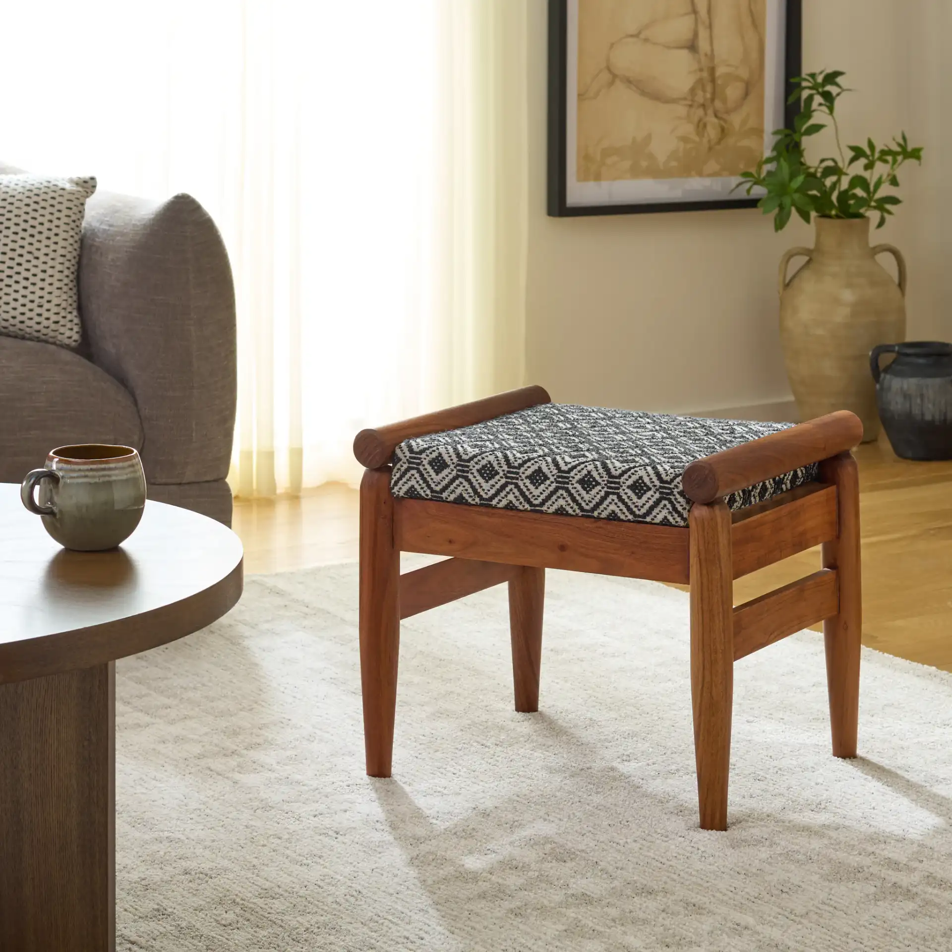 Elmar Ottoman in Navy Blue White / Natural in a styled room