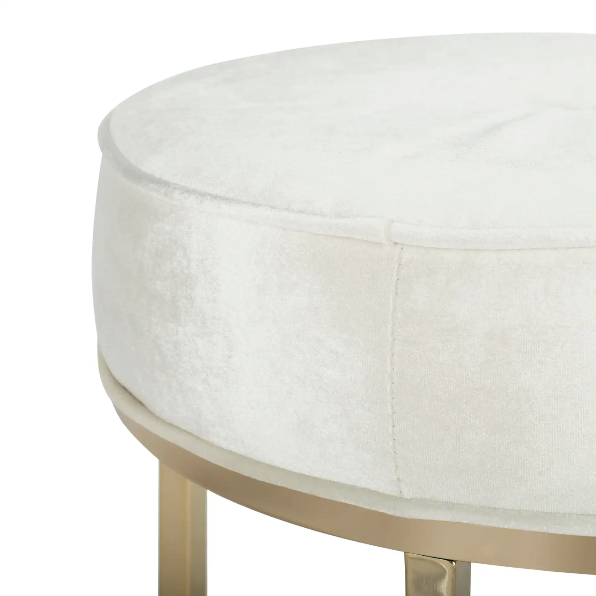 Angelea Round Ottoman in Navy Blue / Brass in a styled room