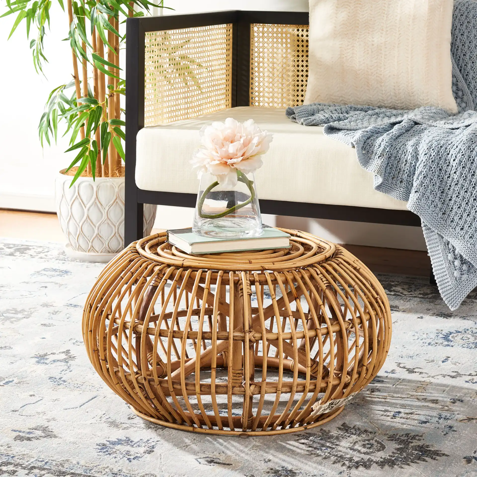 Jacynda Round Ottoman in Honey Brown Wash in a styled room