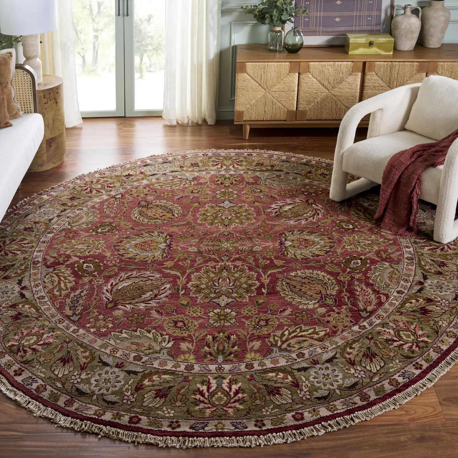 Old World Palmette Leaf Bordered Wool Rug in Copper / Green in a styled room