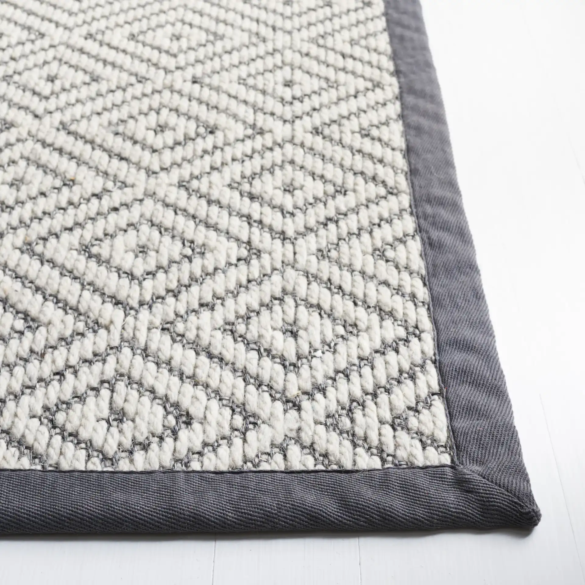 Palm Beach Nested Diamond Rug in Gray / Dark Gray in a styled room