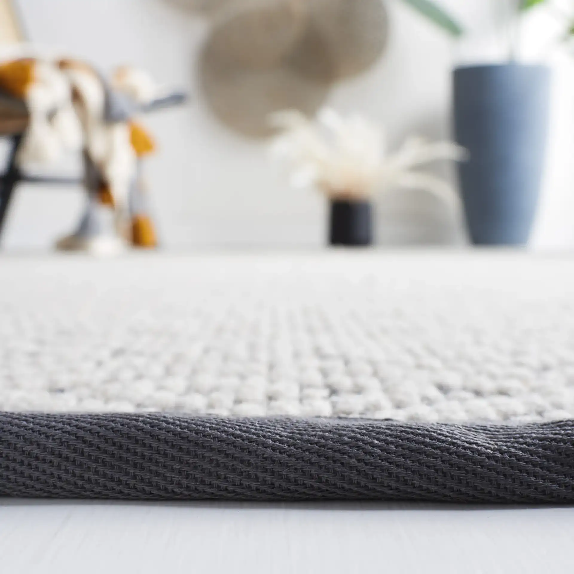 Palm Beach Nested Diamond Rug in Gray / Dark Gray in a styled room