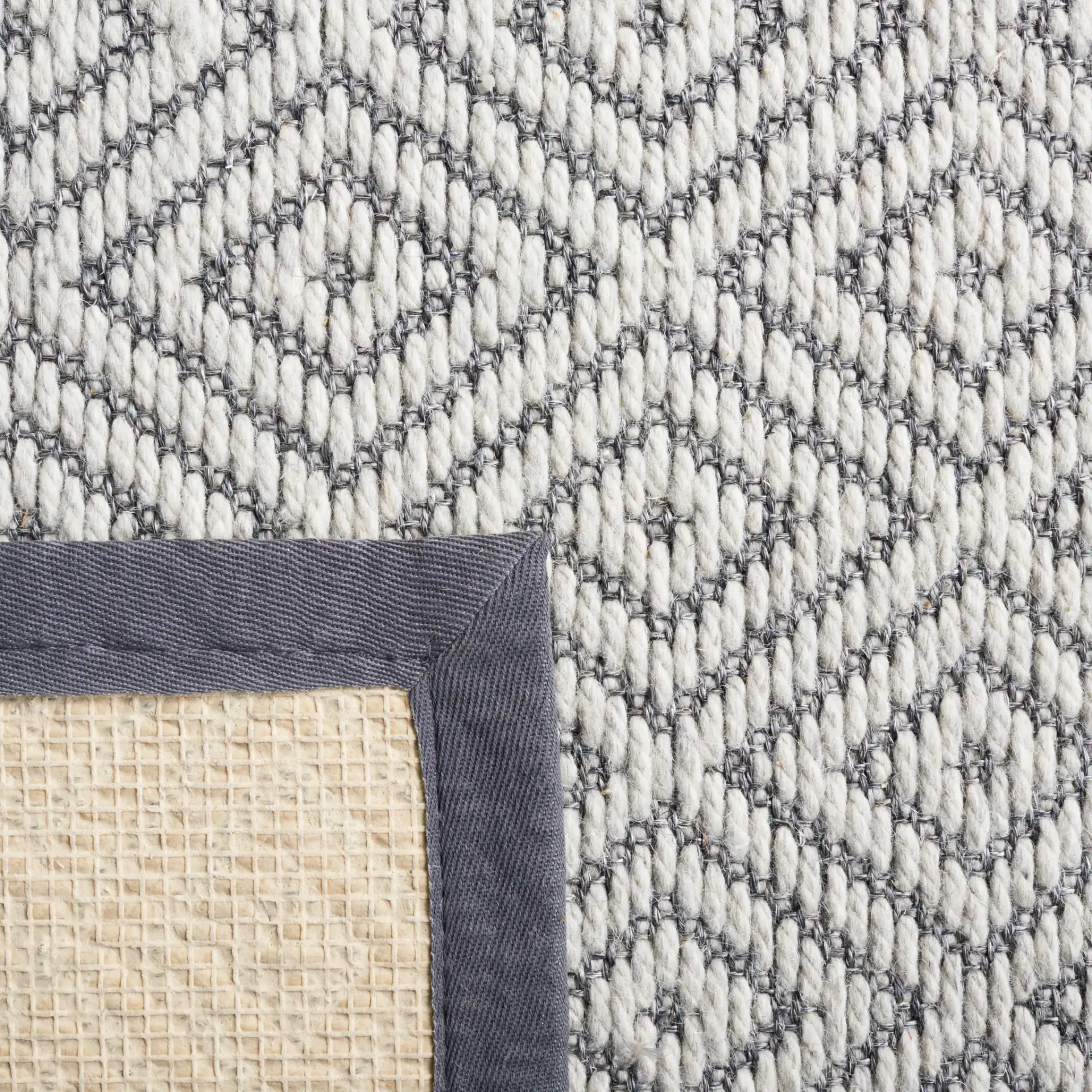 Palm Beach Nested Diamond Rug in Gray / Dark Gray in a styled room