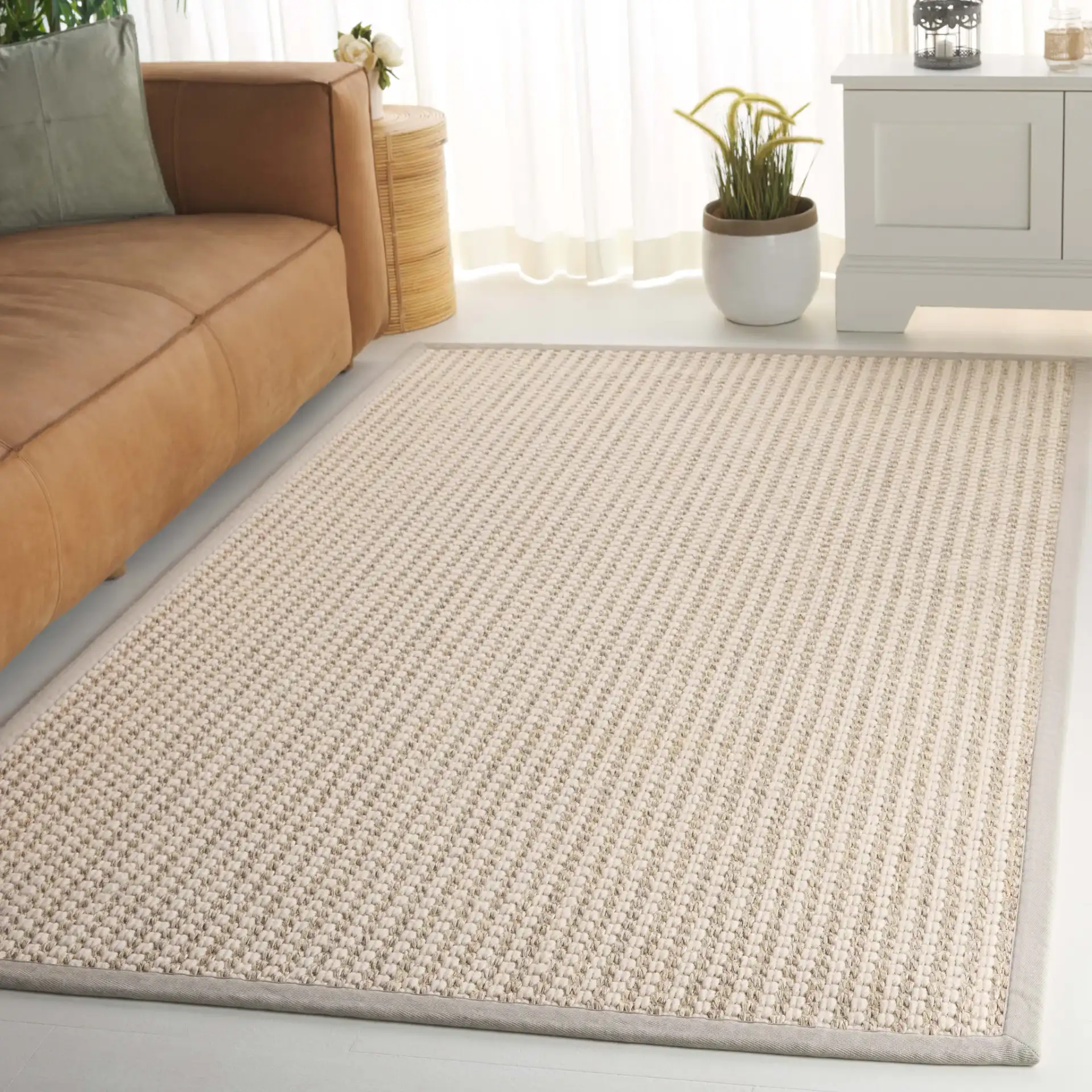 Palm Beach Waffle Bordered Rug in Ivory in a styled room