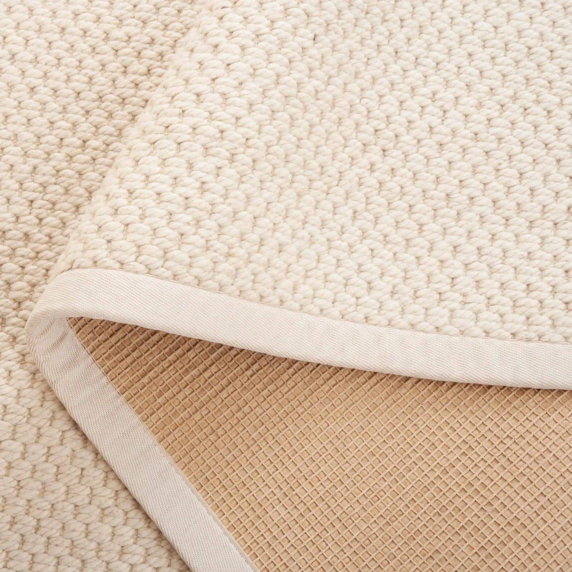 Palm Beach Basketweave Border Wool Rug in Ivory in a styled room