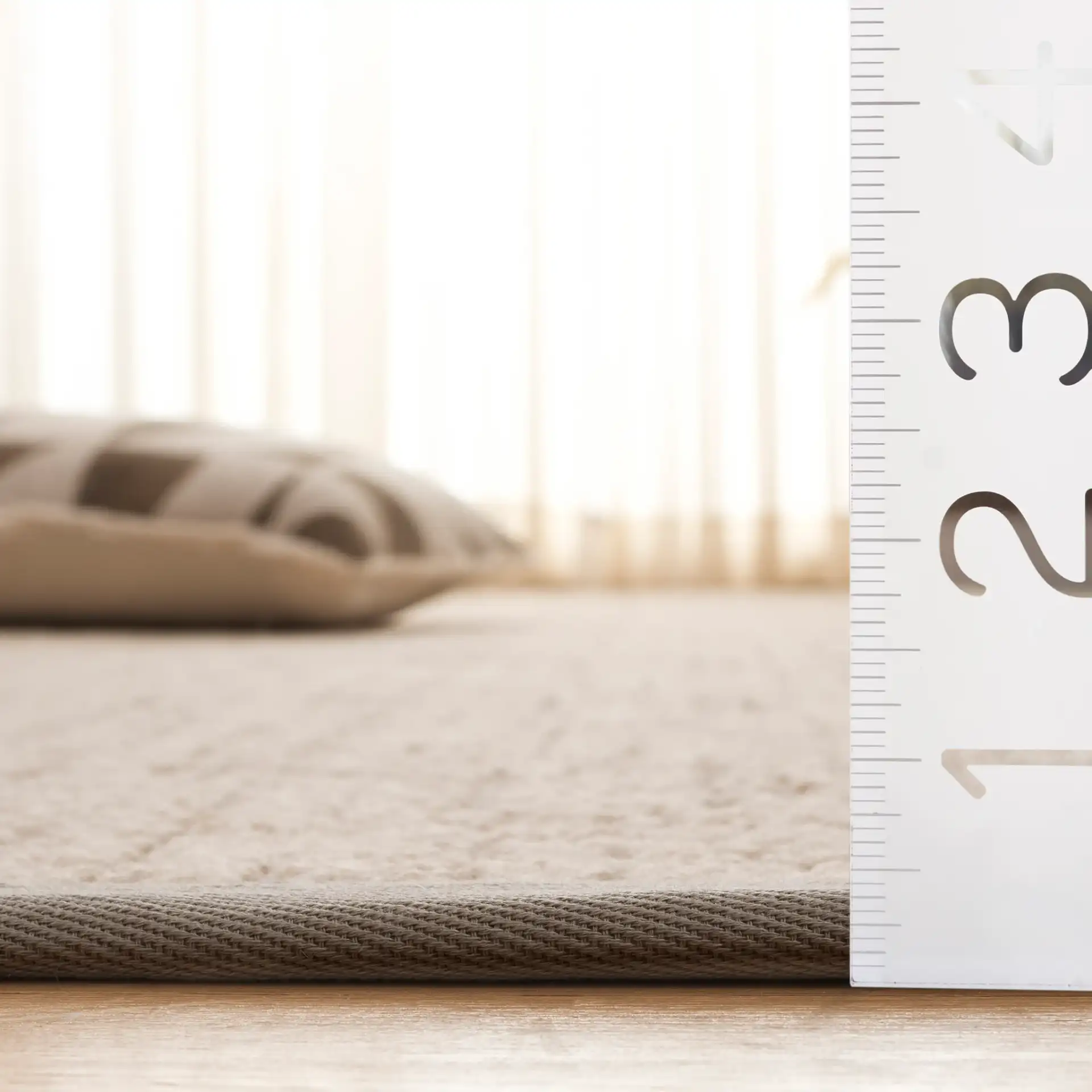 Cottage Bordered Basketweave Wool Rug in Ivory in a styled room