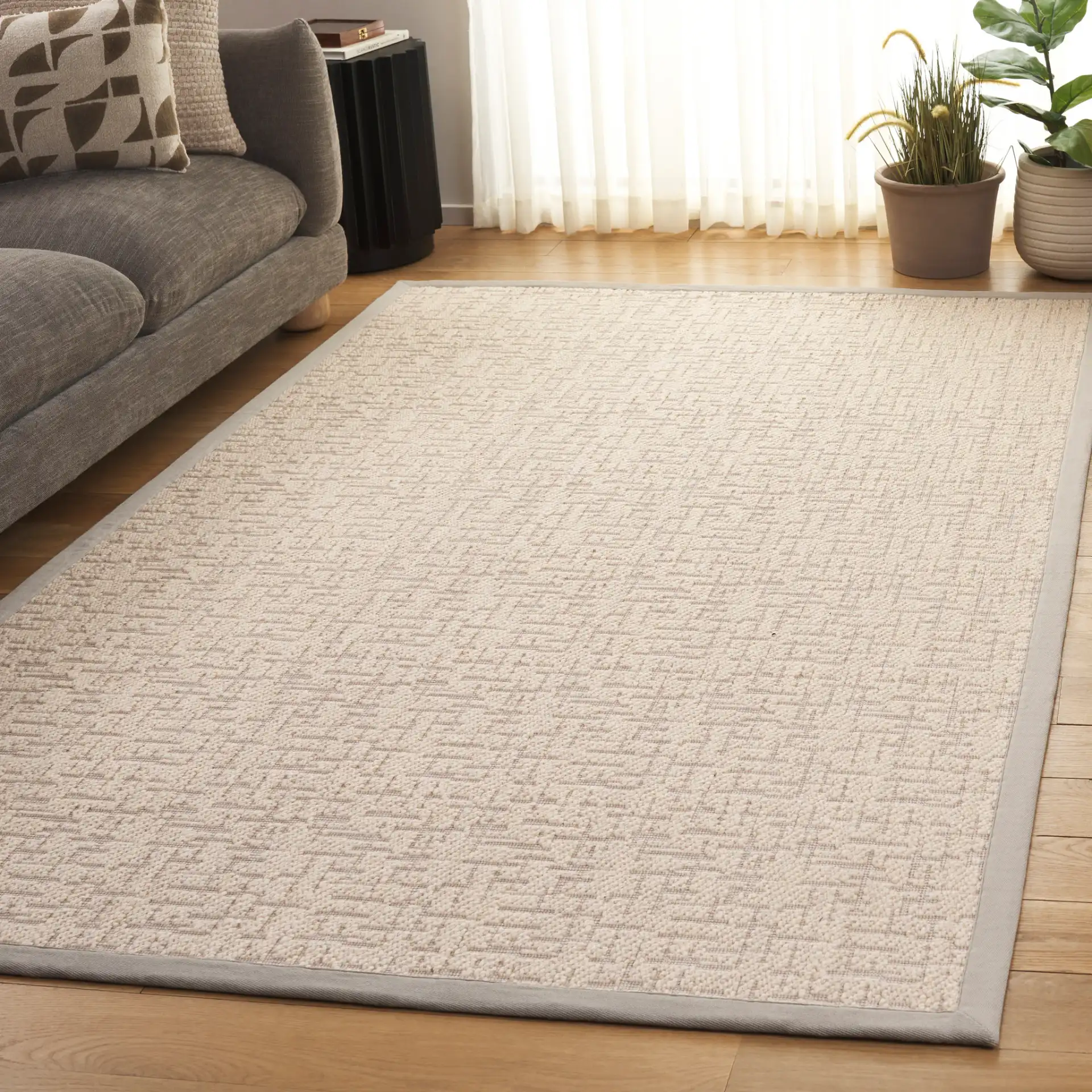 Cottage Bordered Basketweave Wool Rug in Ivory in a styled room