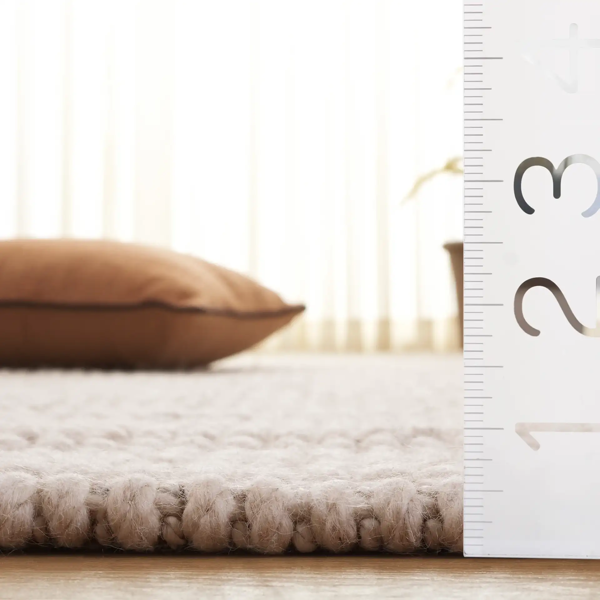 Grid Ribbed Rug in Ivory / Natural in a styled room