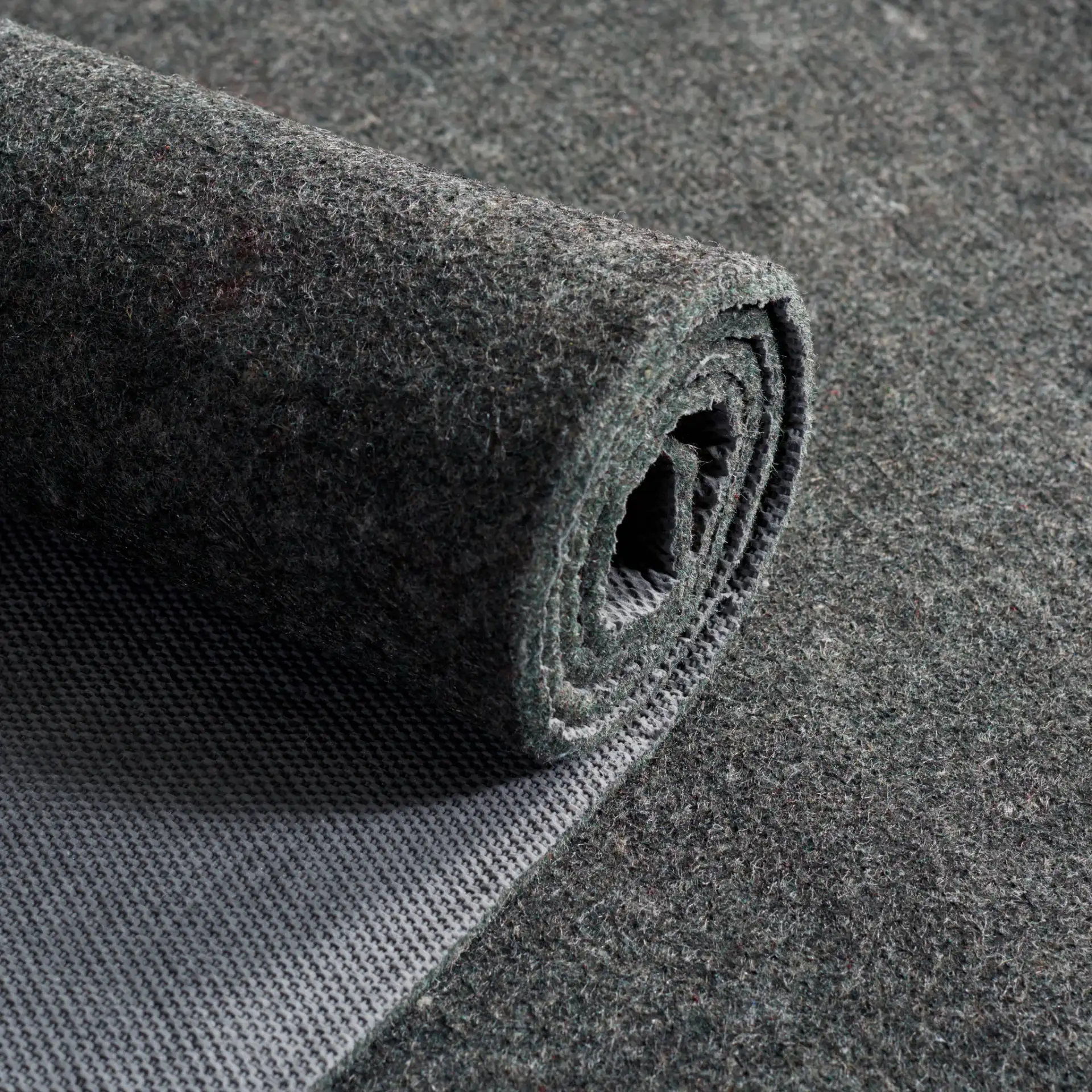 Dura Solid Rug Pad in Gray in a styled room